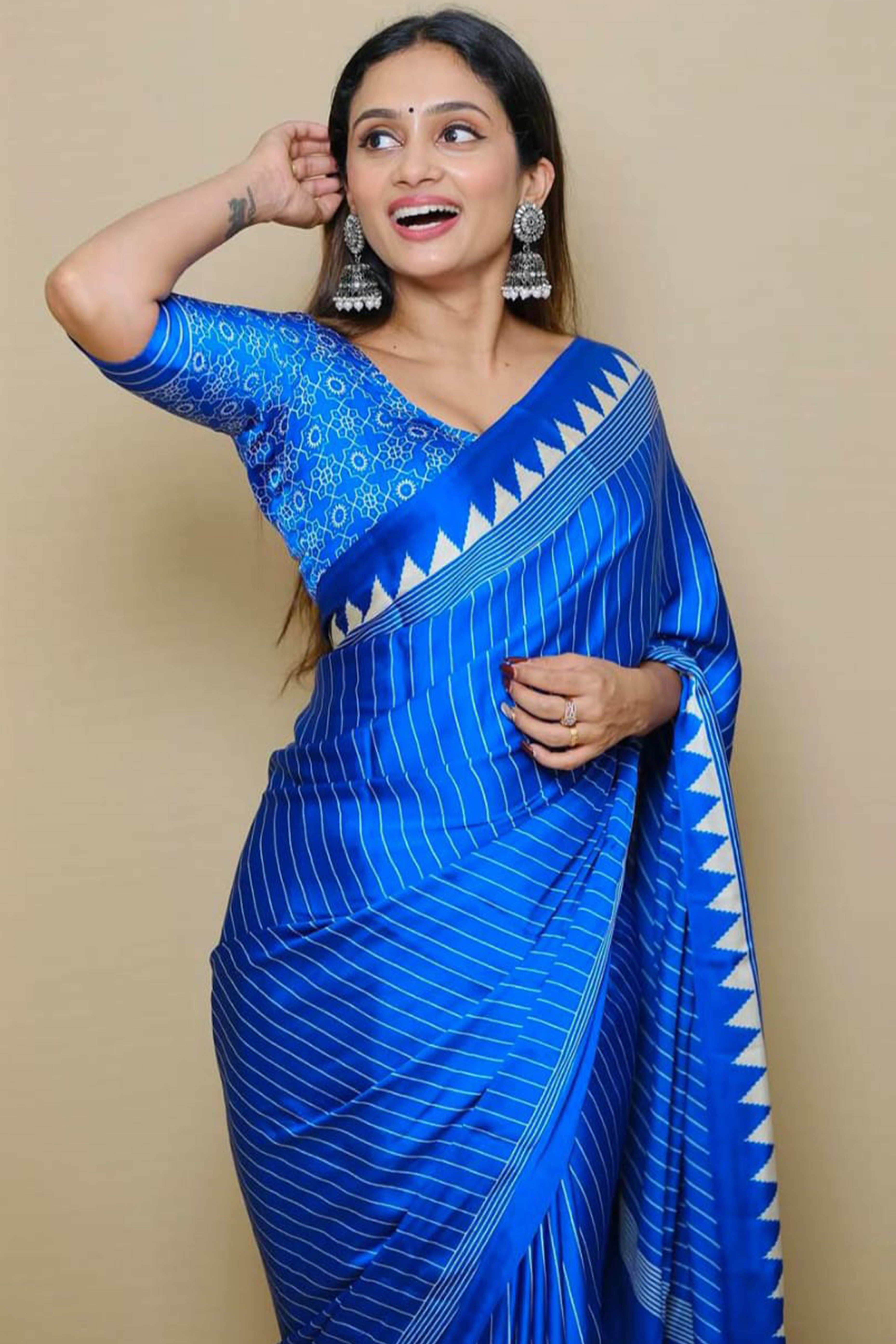 Blue Crepe Saree with Bold Striped Print and Smooth Finish for Partywear