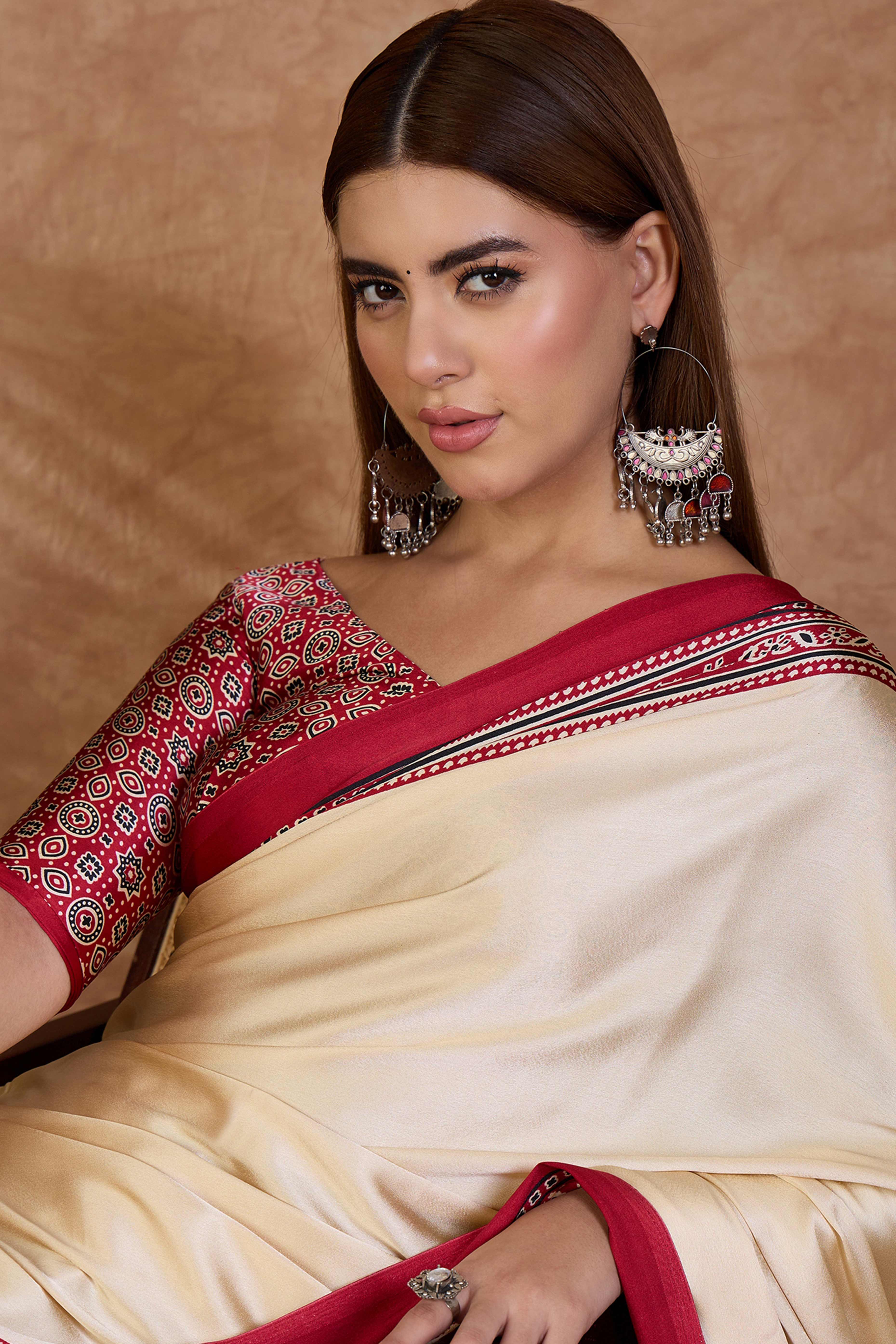 Cream & Red Modal Satin Saree Featuring a Solid Base and Artisanal Ajrakh Pallu