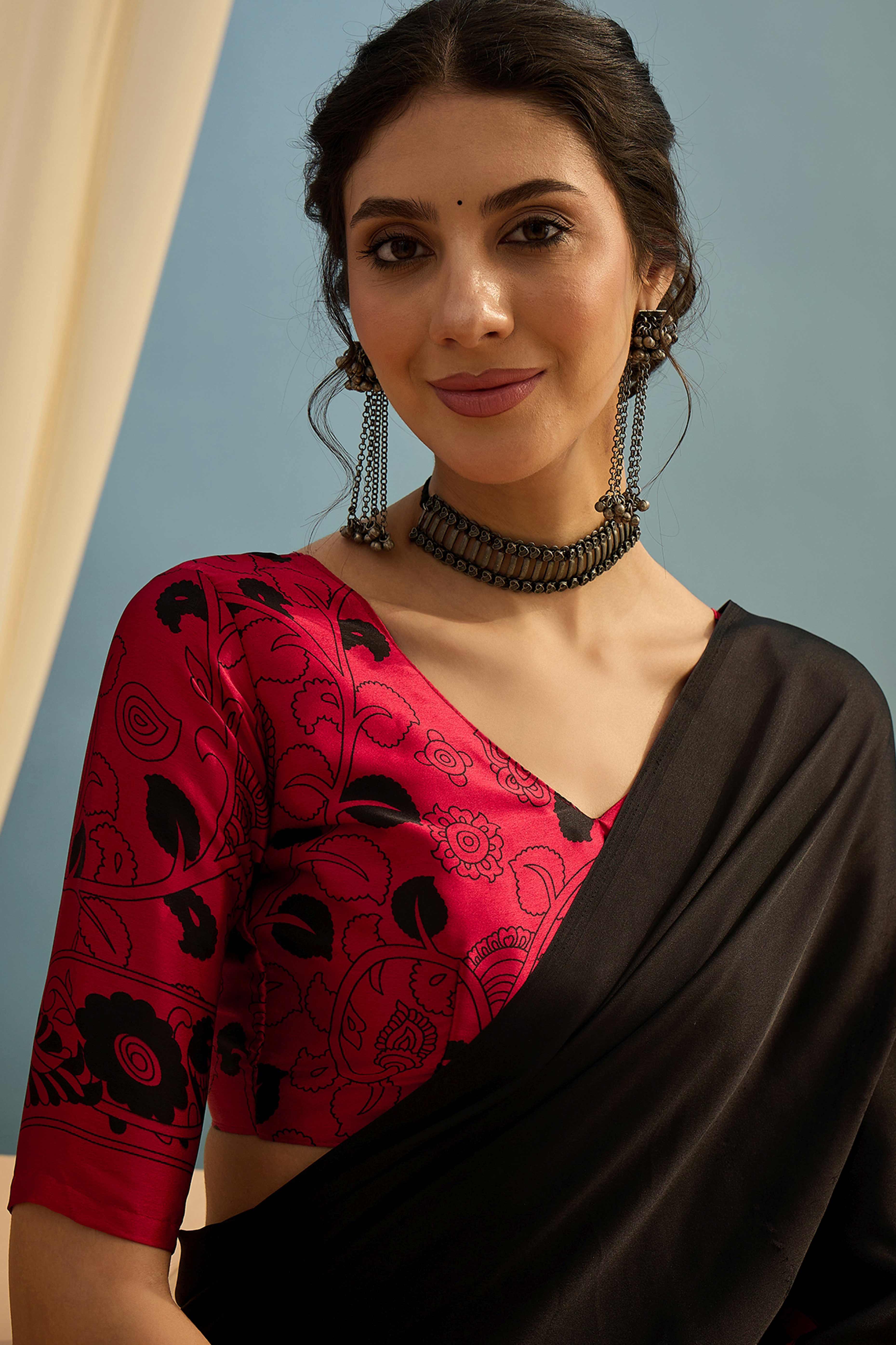 Black & Pink Kalamkari Style Modal Satin Saree Featuring Intricate Artistic Prints