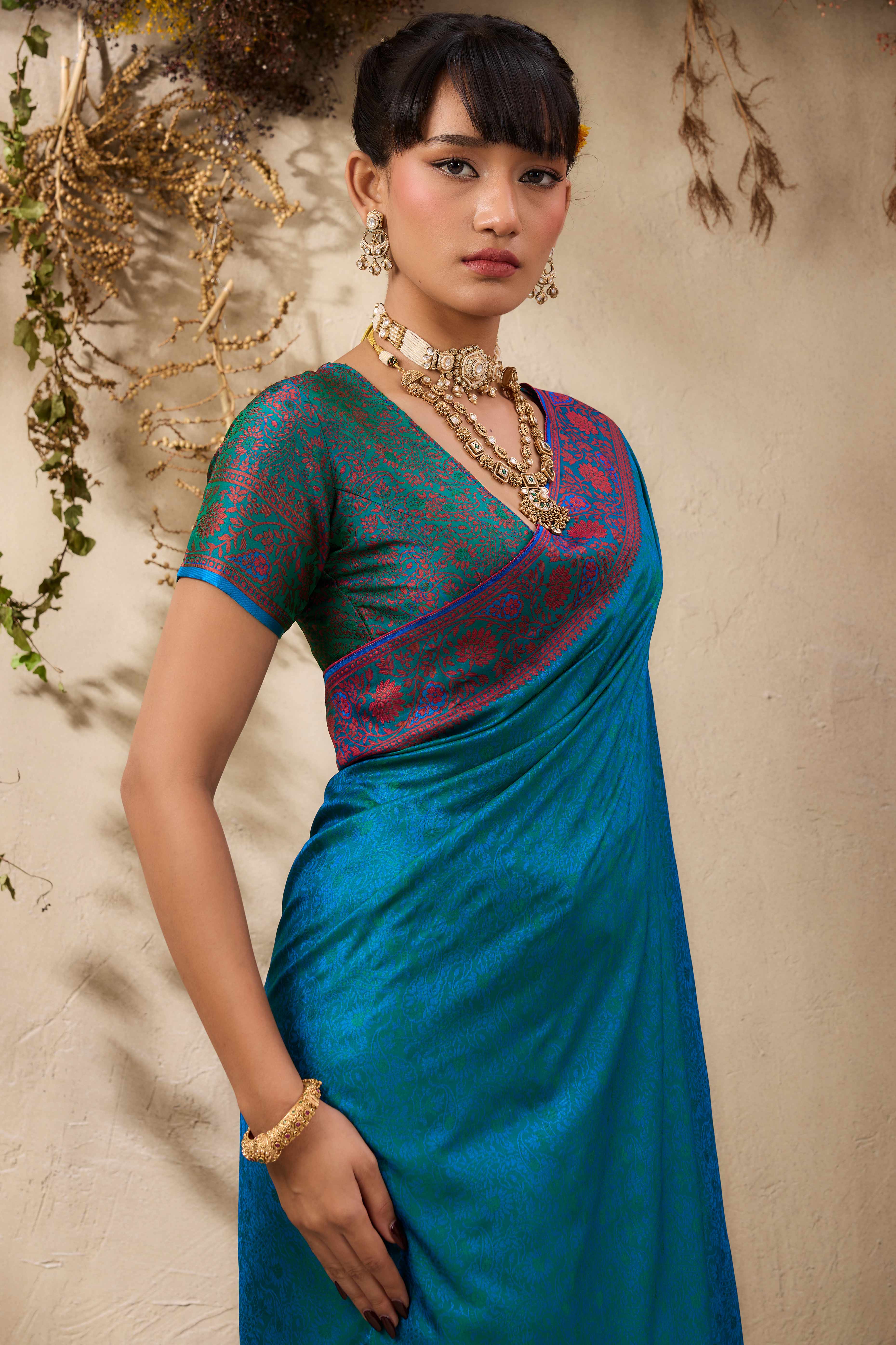 Teal Pure Silk Kanjivaram Handloom Saree Enhanced with Zari Woven Patterns