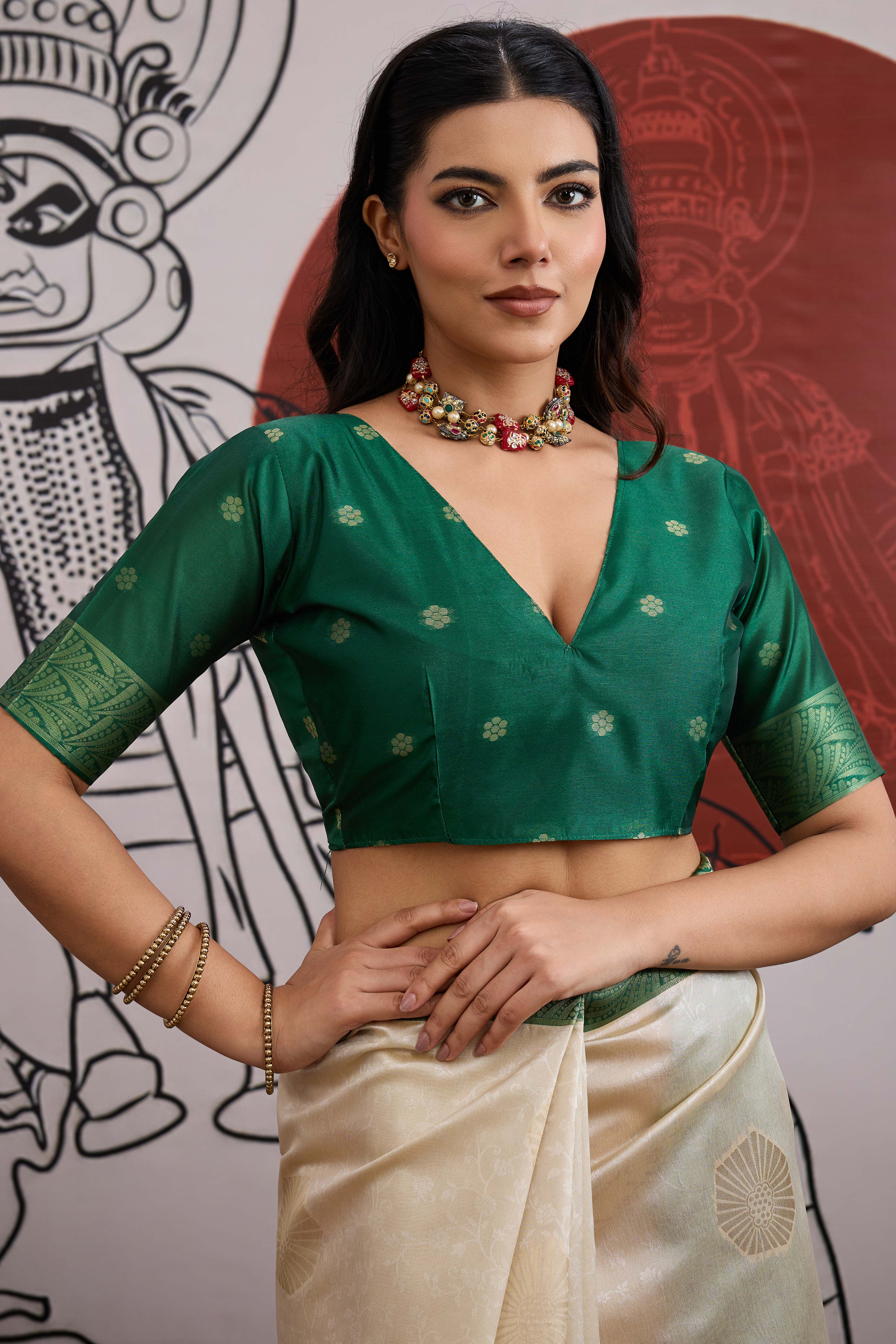 Graceful Cream & Green Zari Weaving Silk Saree Highlighted By Decorative Tassel Pallu