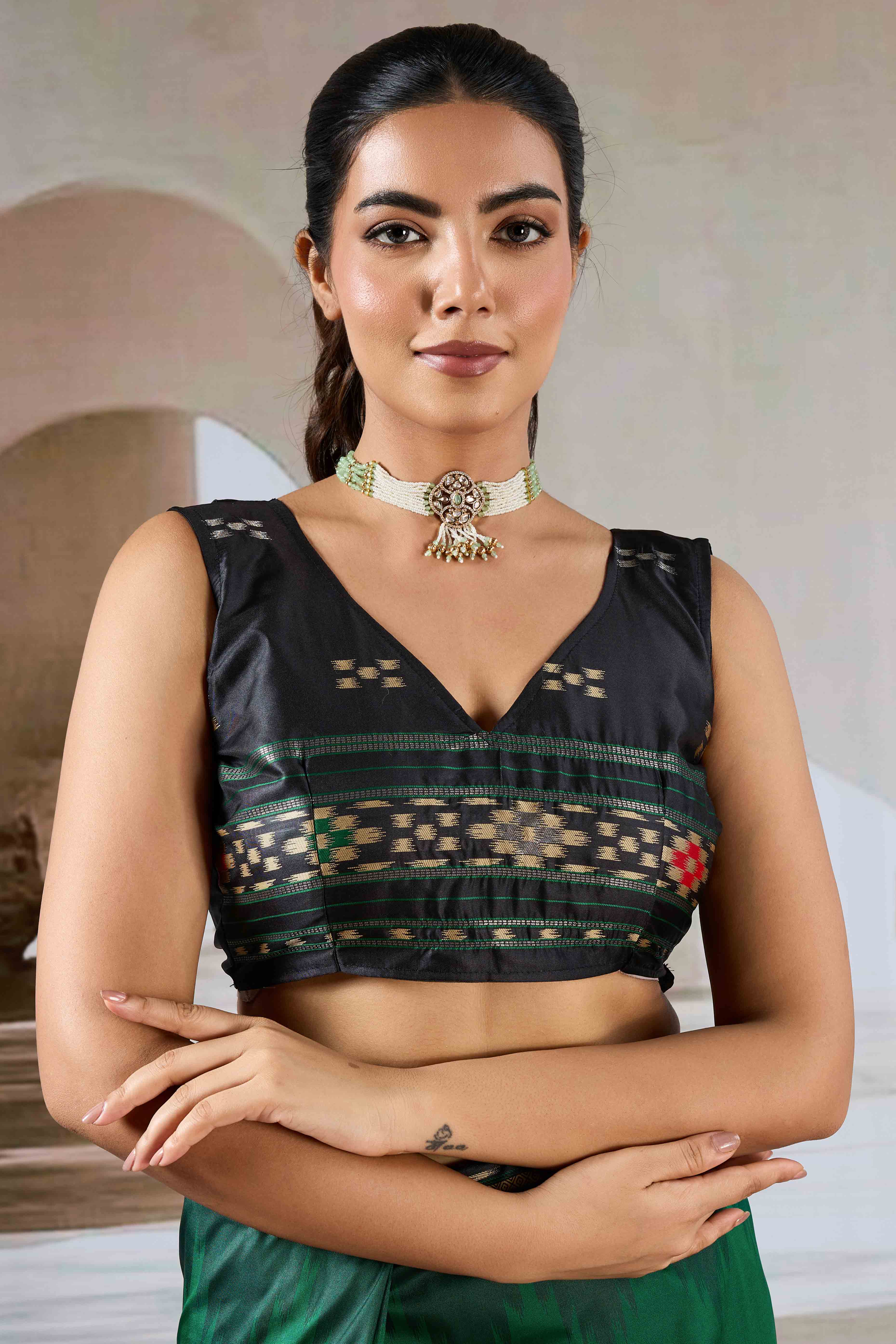 Green Art Silk Saree Adorned with Intricate Patola Style Woven Designs