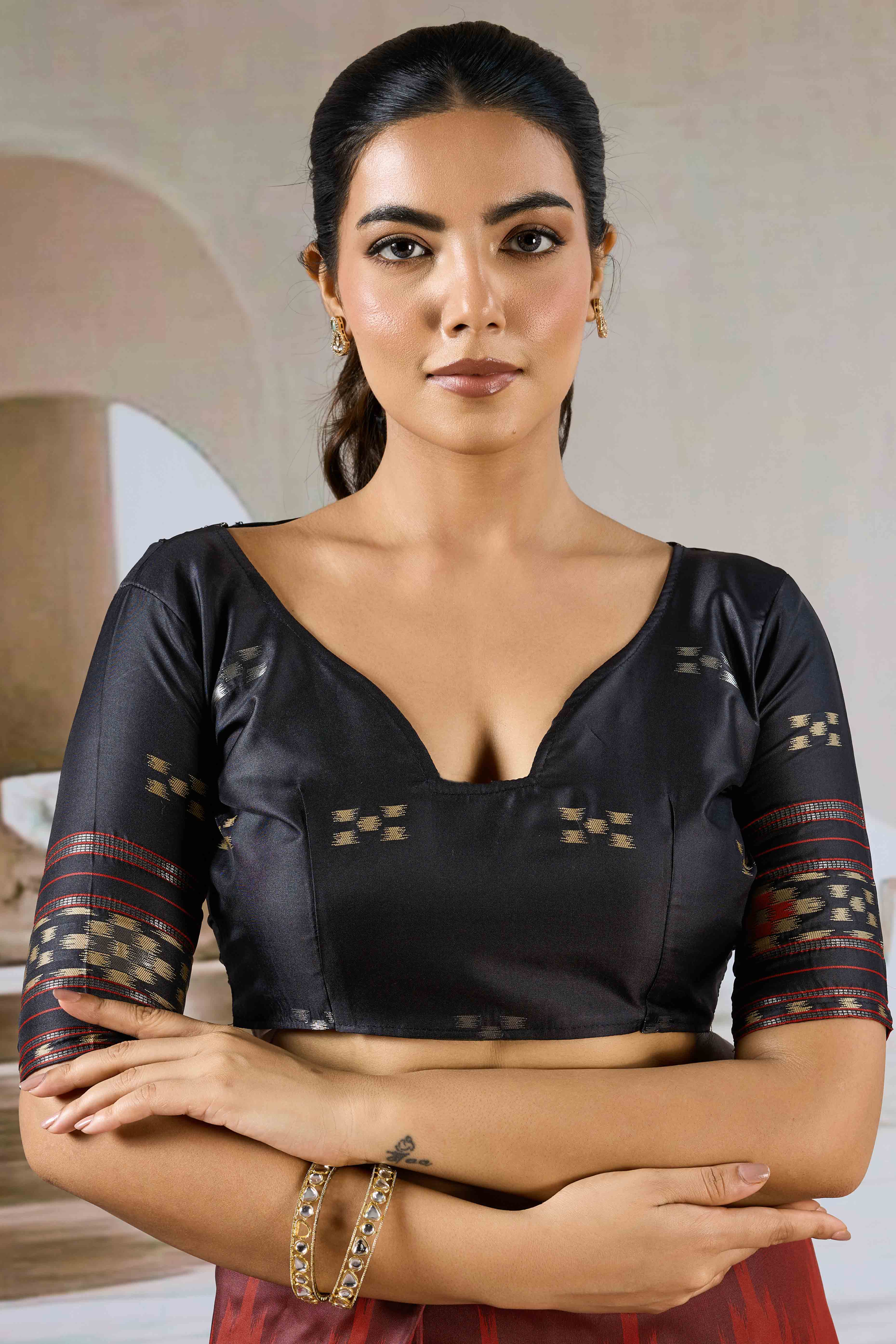 Maroon Art Silk Saree Adorned with Intricate Patola Style Woven Designs