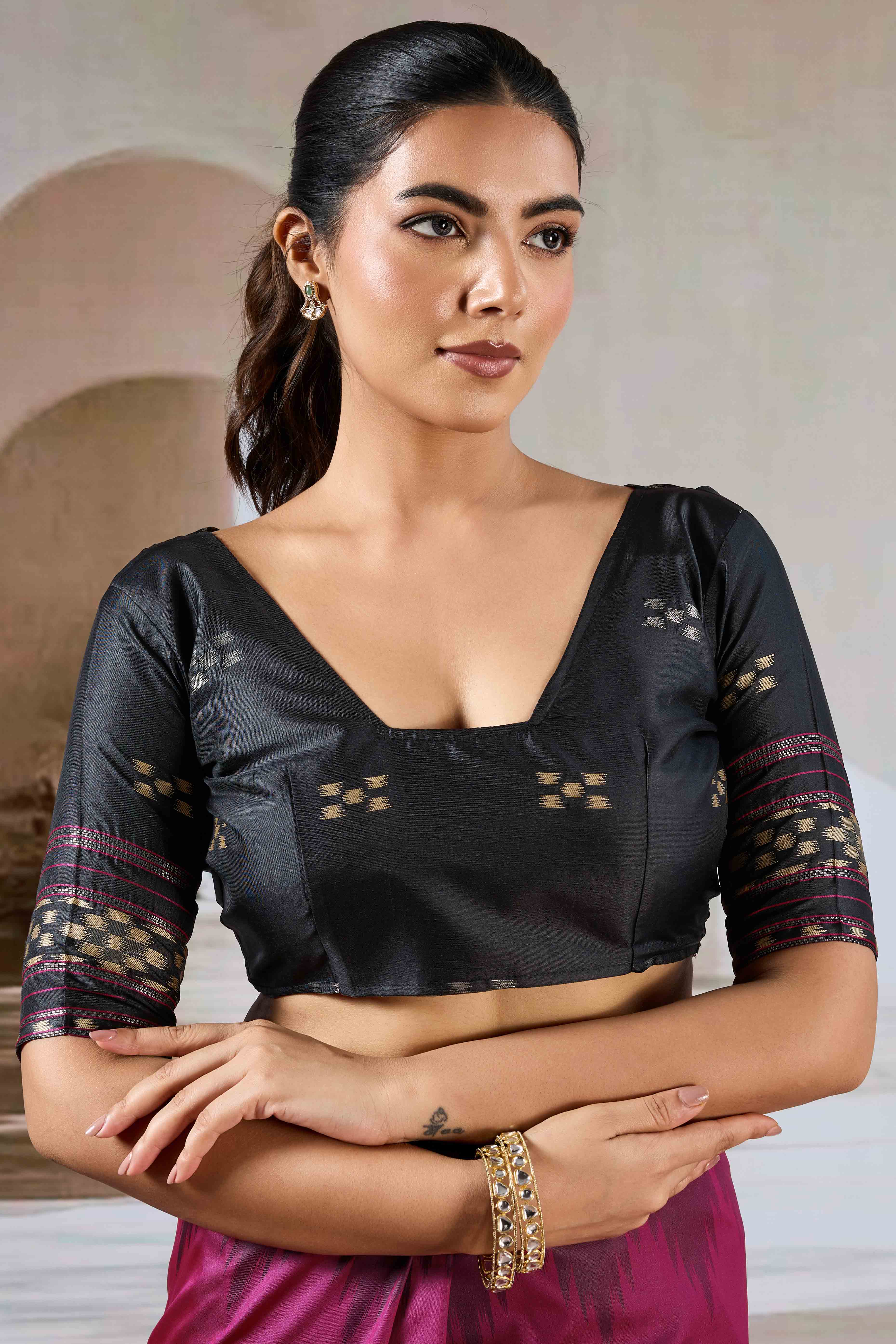 Magenta Art Silk Saree Adorned with Intricate Patola Style Woven Designs