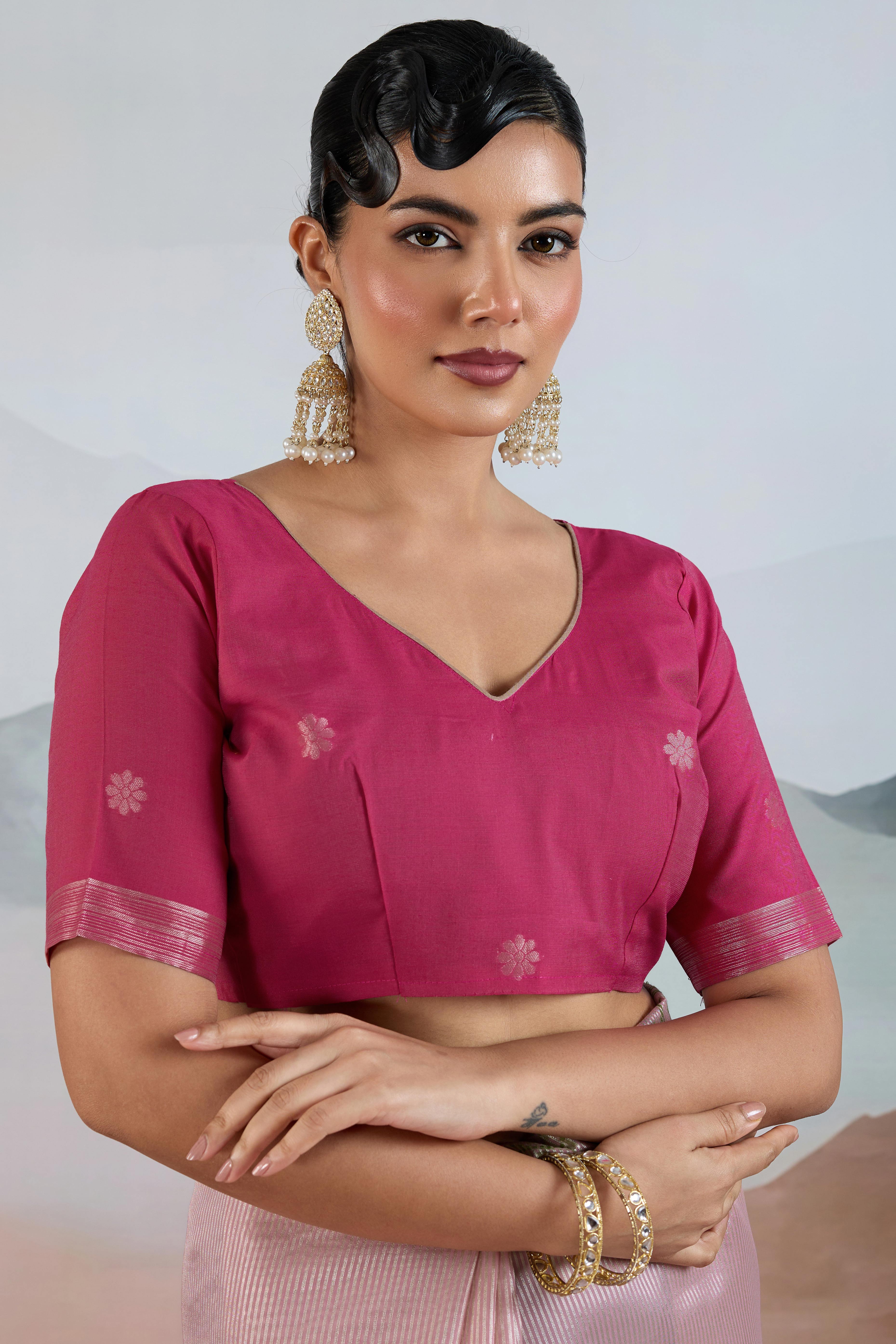 Pink Tissue Silk Saree Showcasing Floral & Striped Weaving With Tassel Adornment