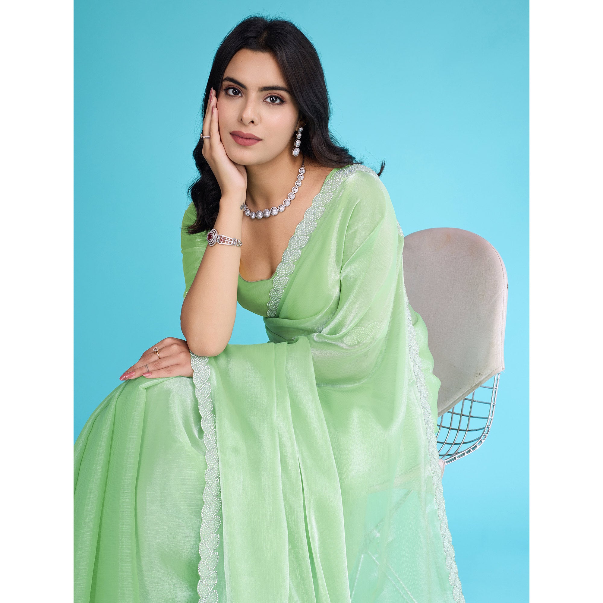Green Solid With Zarkan & Ceramic Pearl Diamond Lace Tissue Saree