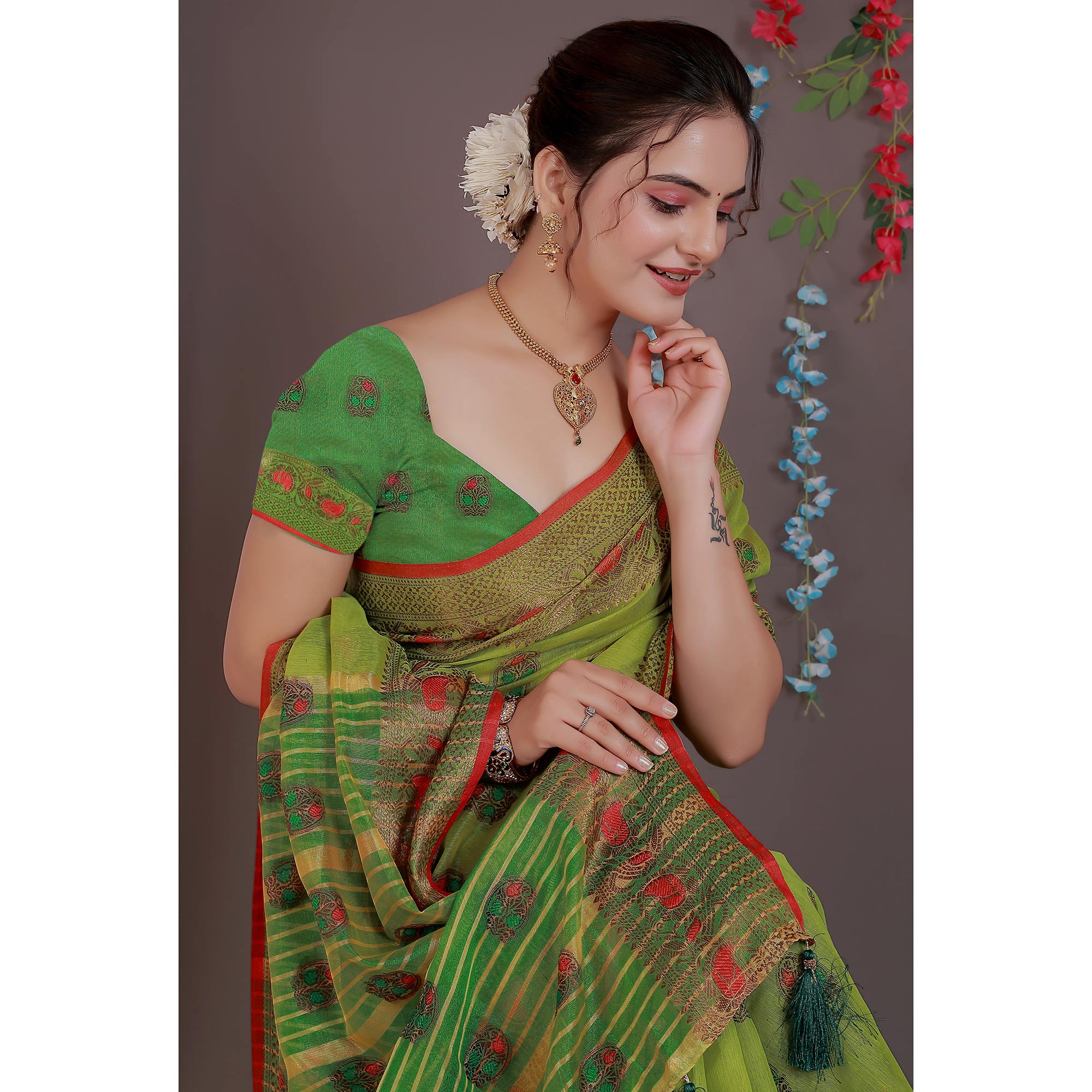 Green Floral Woven Cotton Silk Saree With Tassels