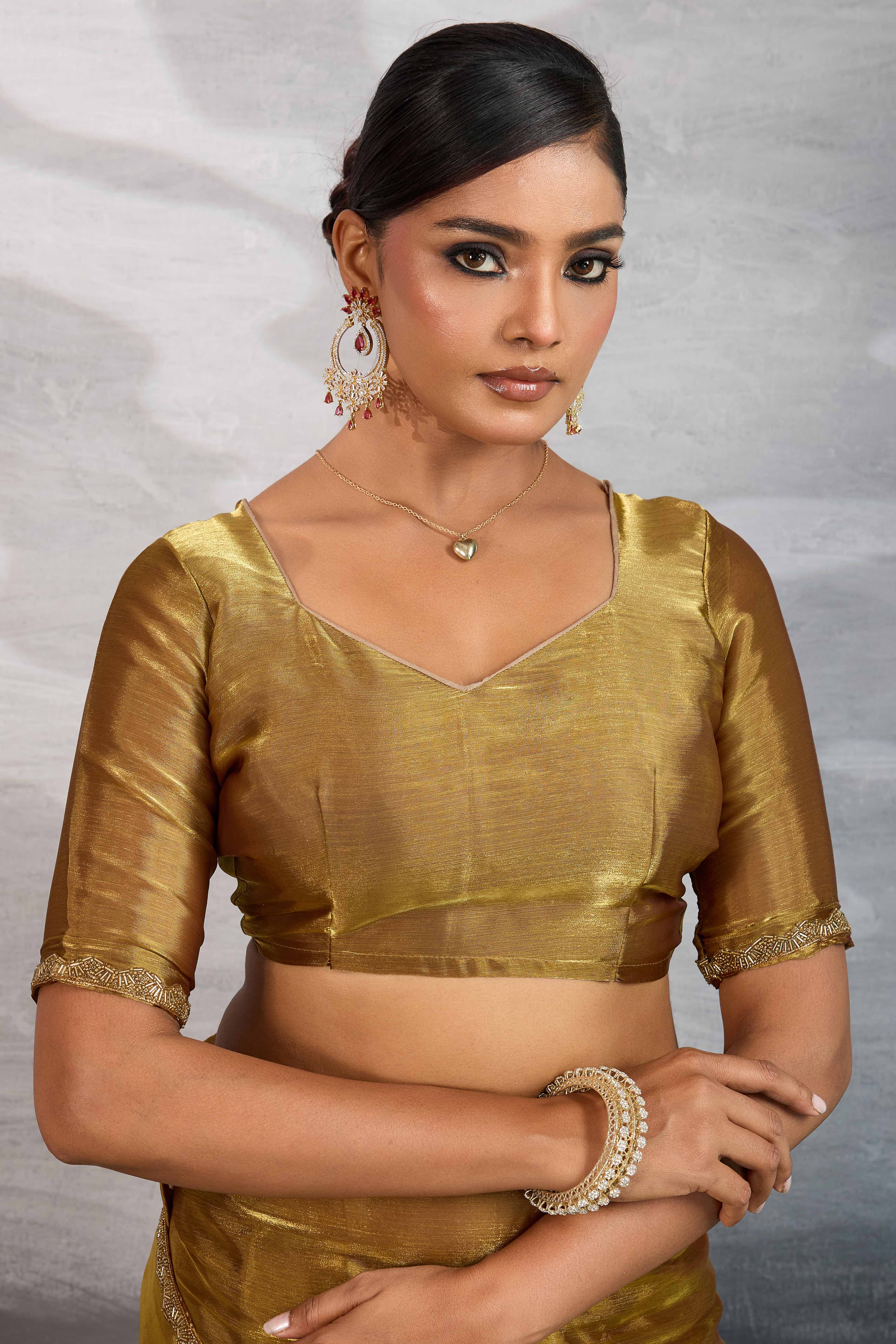 Solid Gold Chiffon Saree Featuring Beads Embellished Border