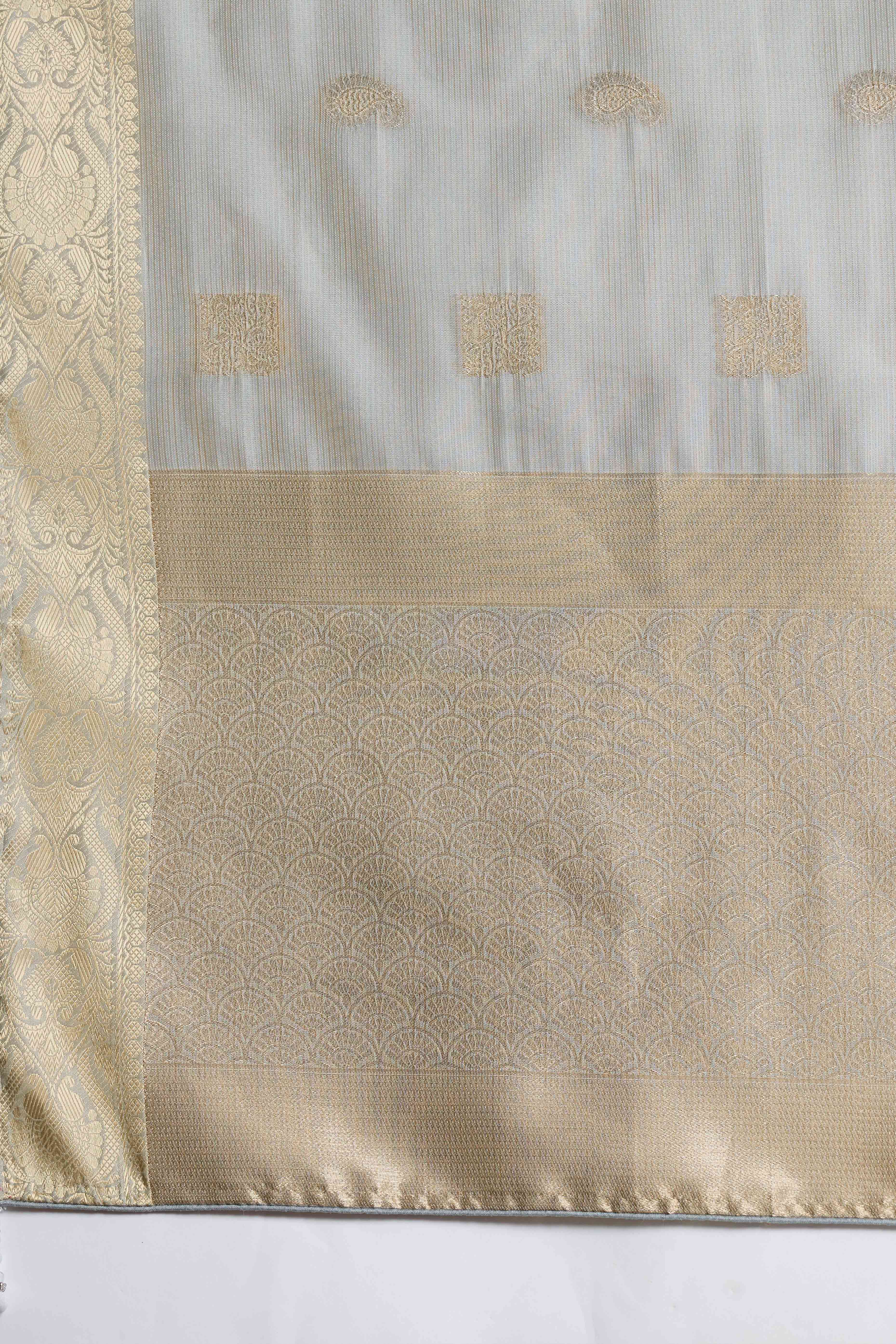 Contemporary Grey Silk Blend Saree Flaunting Alternate Buttas With Piping & Tassel Accents