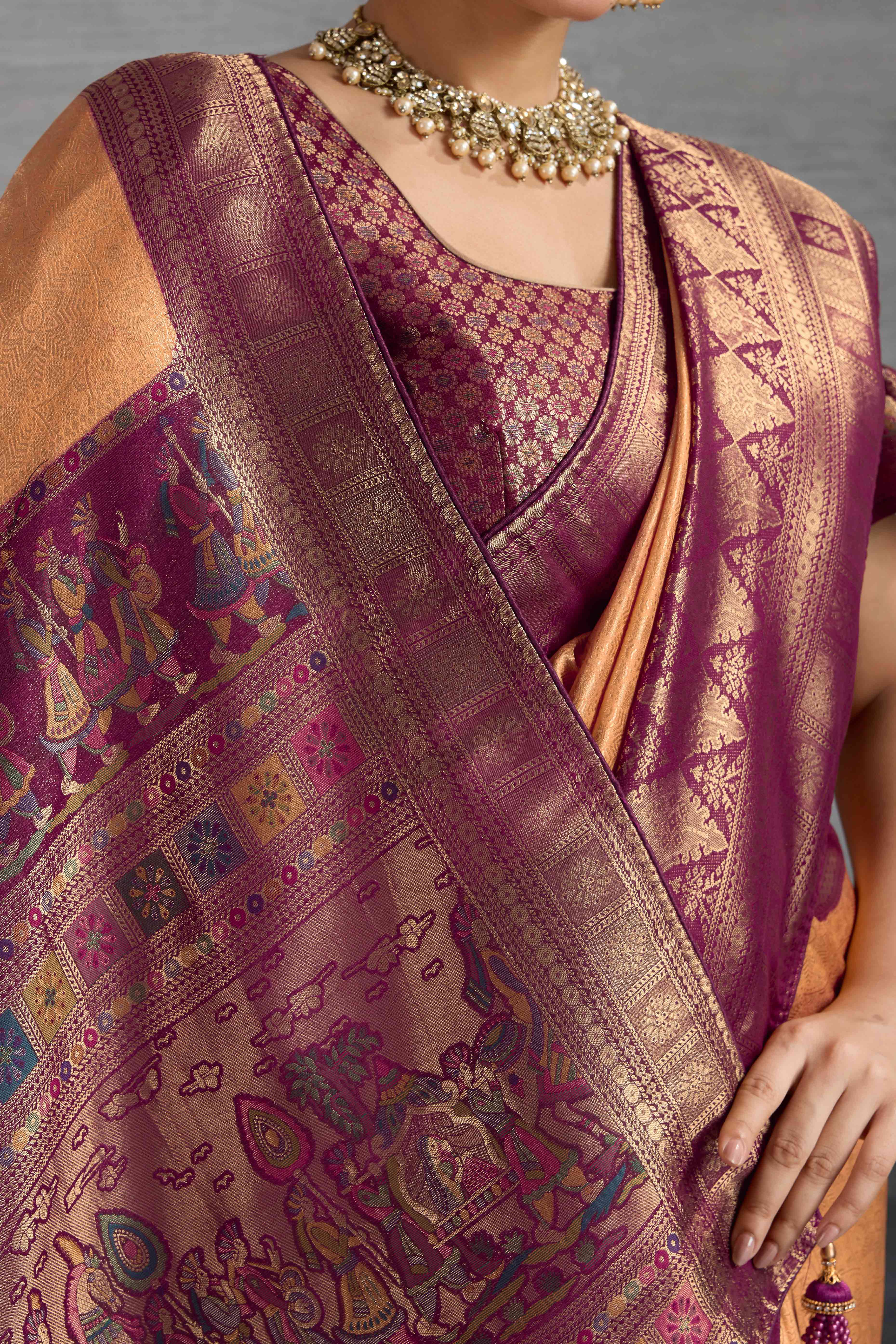 Peach Silk Kanjivaram Silk Saree Enhanced With Meenakari Weaving Borders