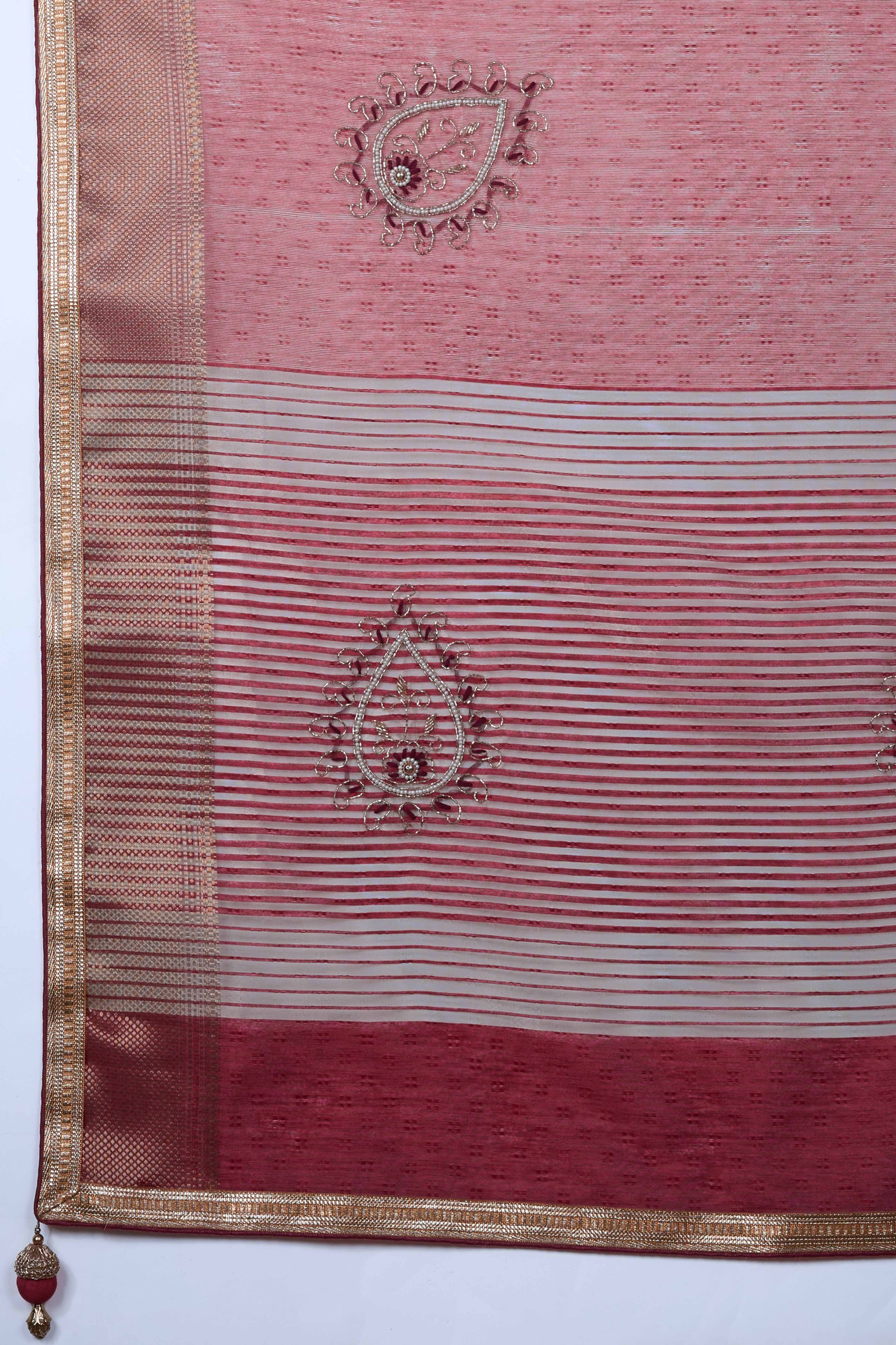 Pink Woven Linen Tissue Saree Featuring Beads Embellishment