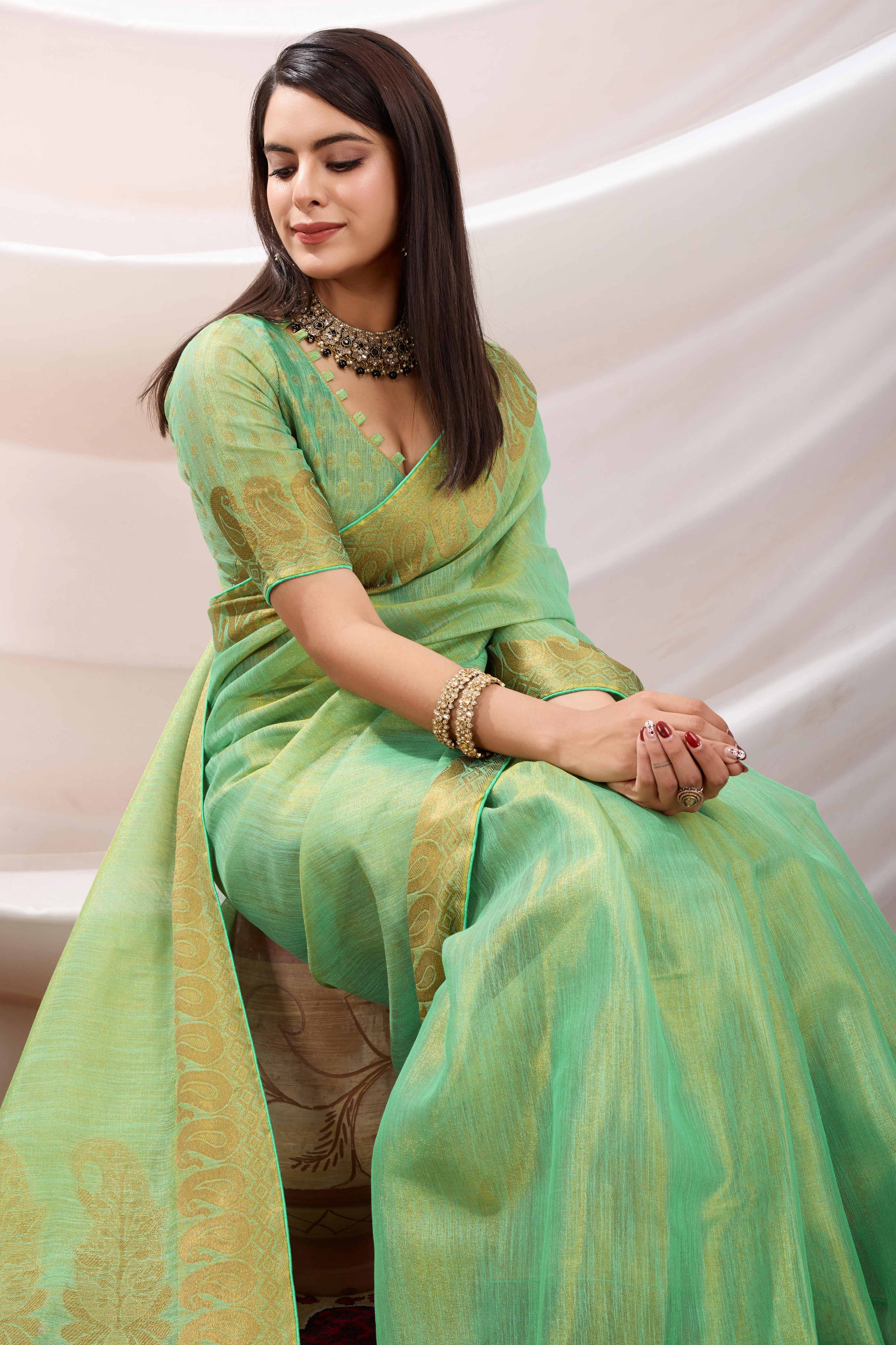 Sea Green Festive Linen Tissue Saree with Zari Borders