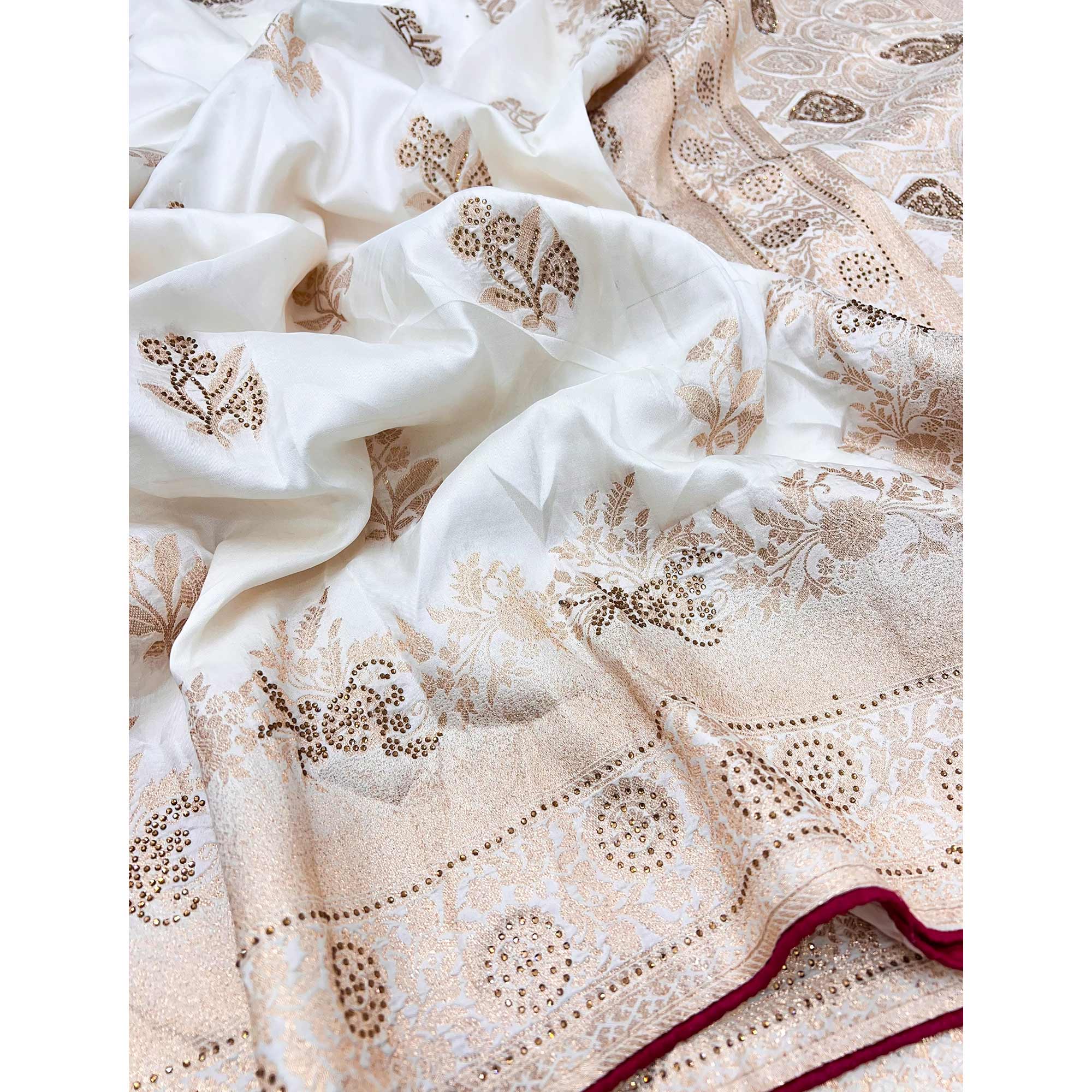 Offwhite Elegant White Dola Silk Saree with Intricate Weaving and Sparkling Stonework