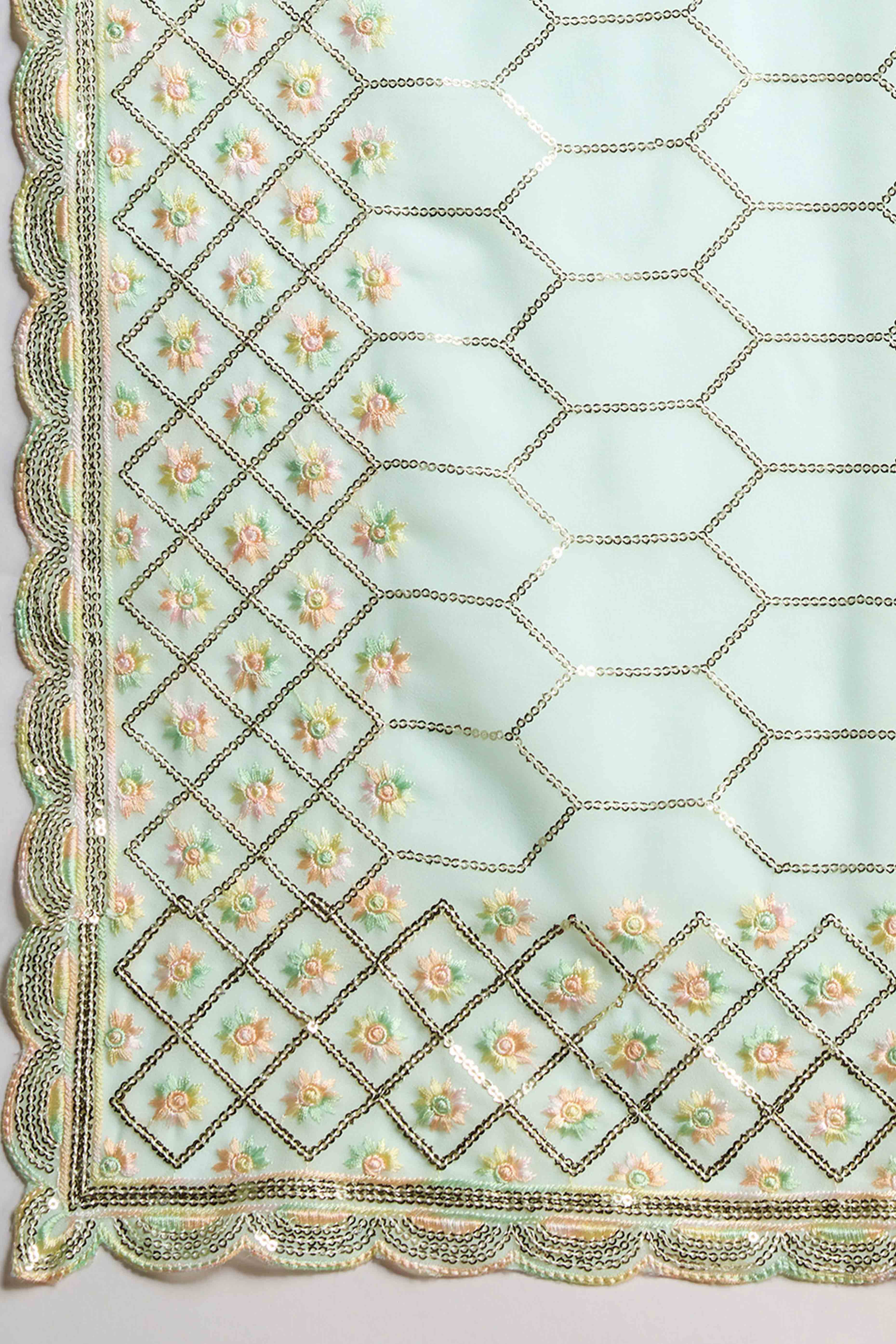 Mint Green Georgette Saree Enhanced with Elegant Sequins Embellishments