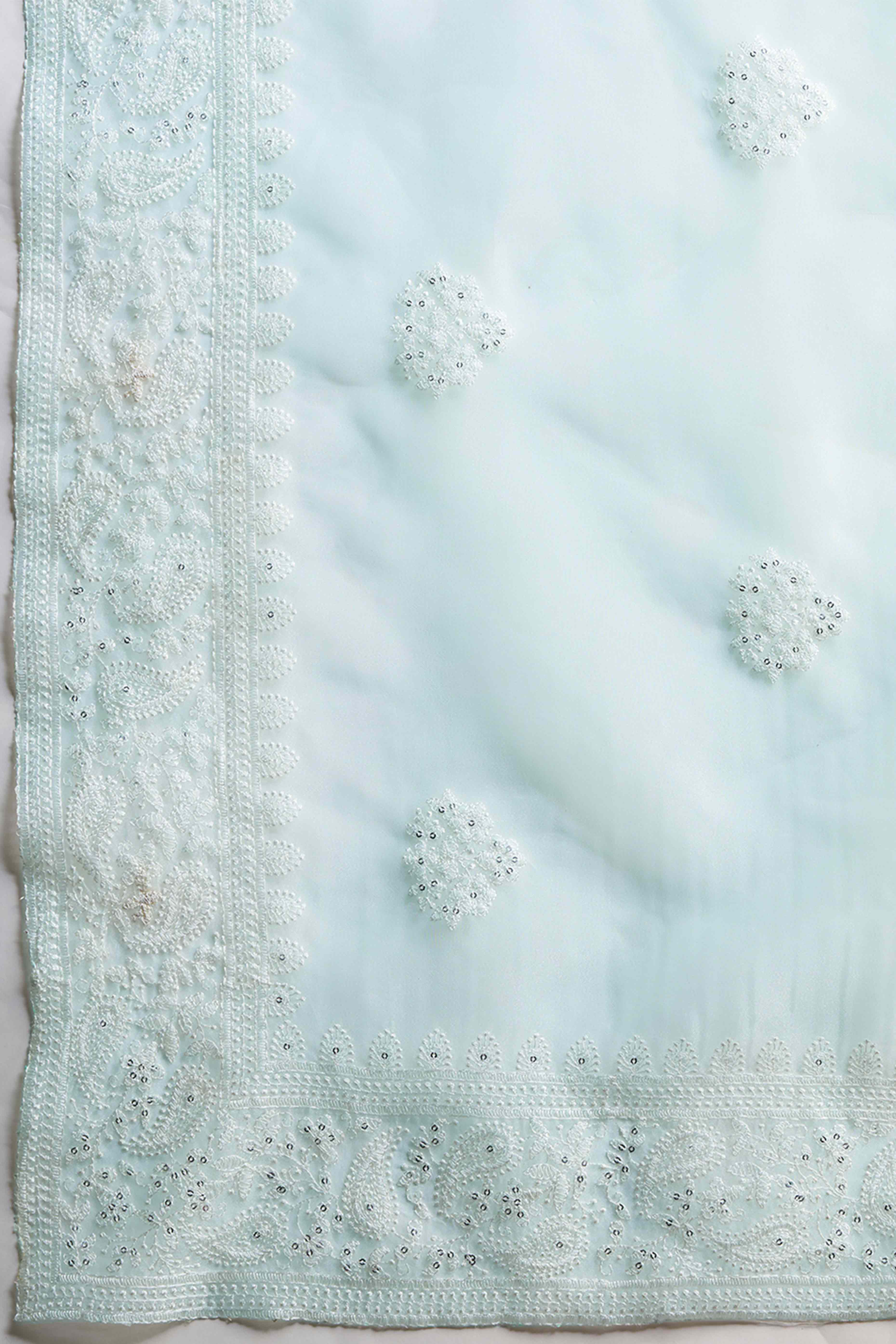 Mint Green Net Saree Enhanced with Elegant Sequins Embellishments