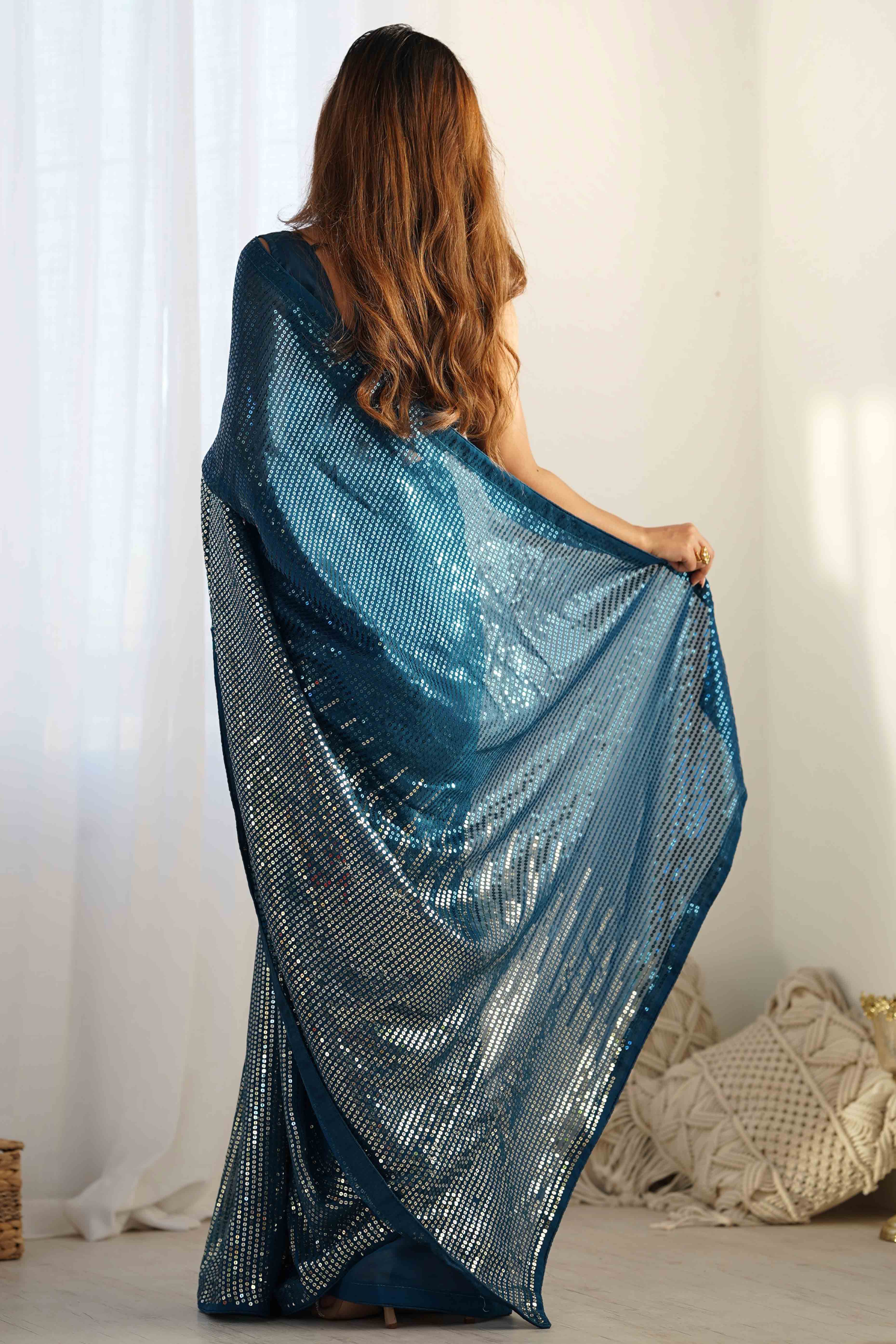 Teal Sequins Embroidered Georgette Saree