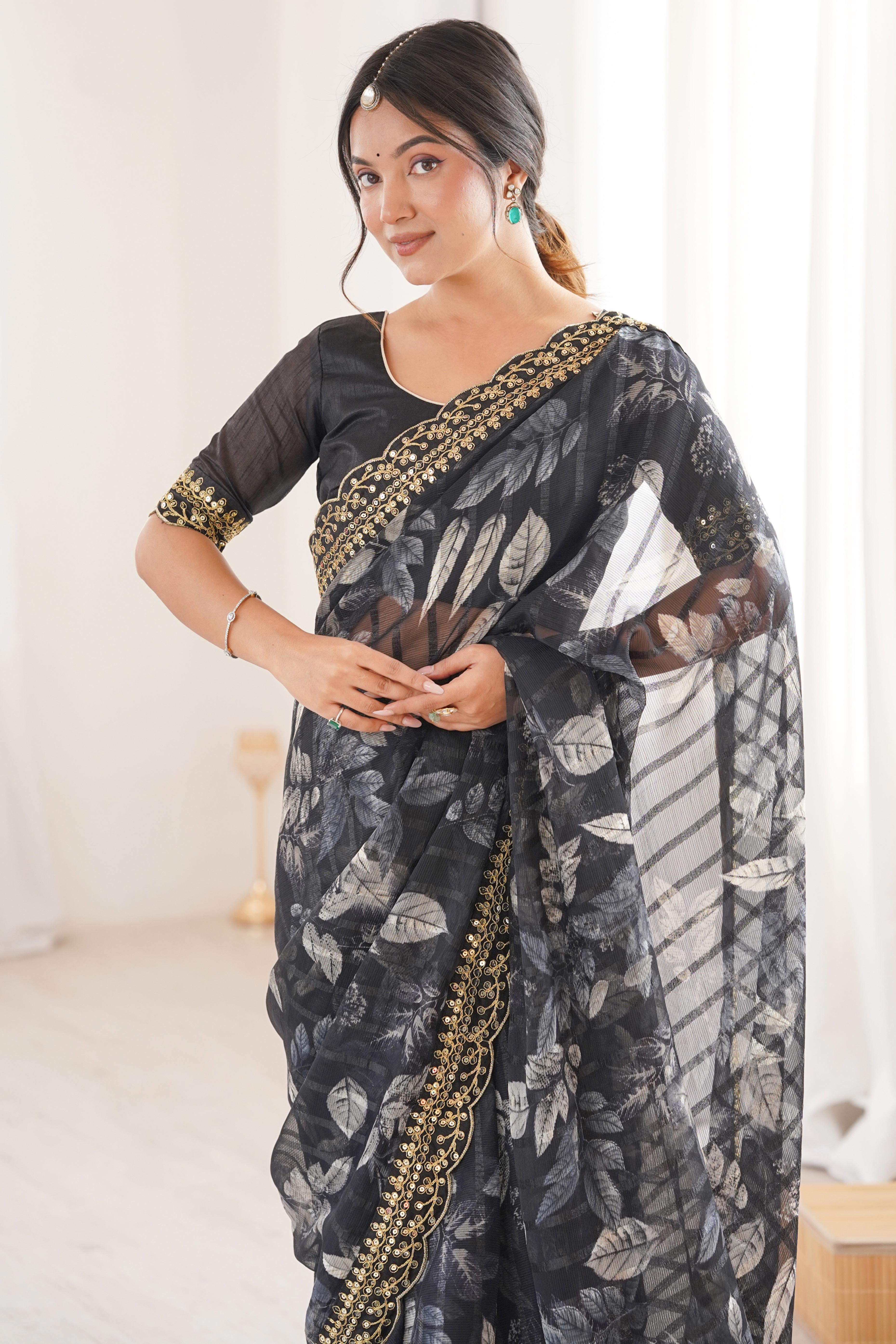 Elegant Black Leaf & Floral Print Georgette Saree With Intricate Cording Sequins Embroidery Border