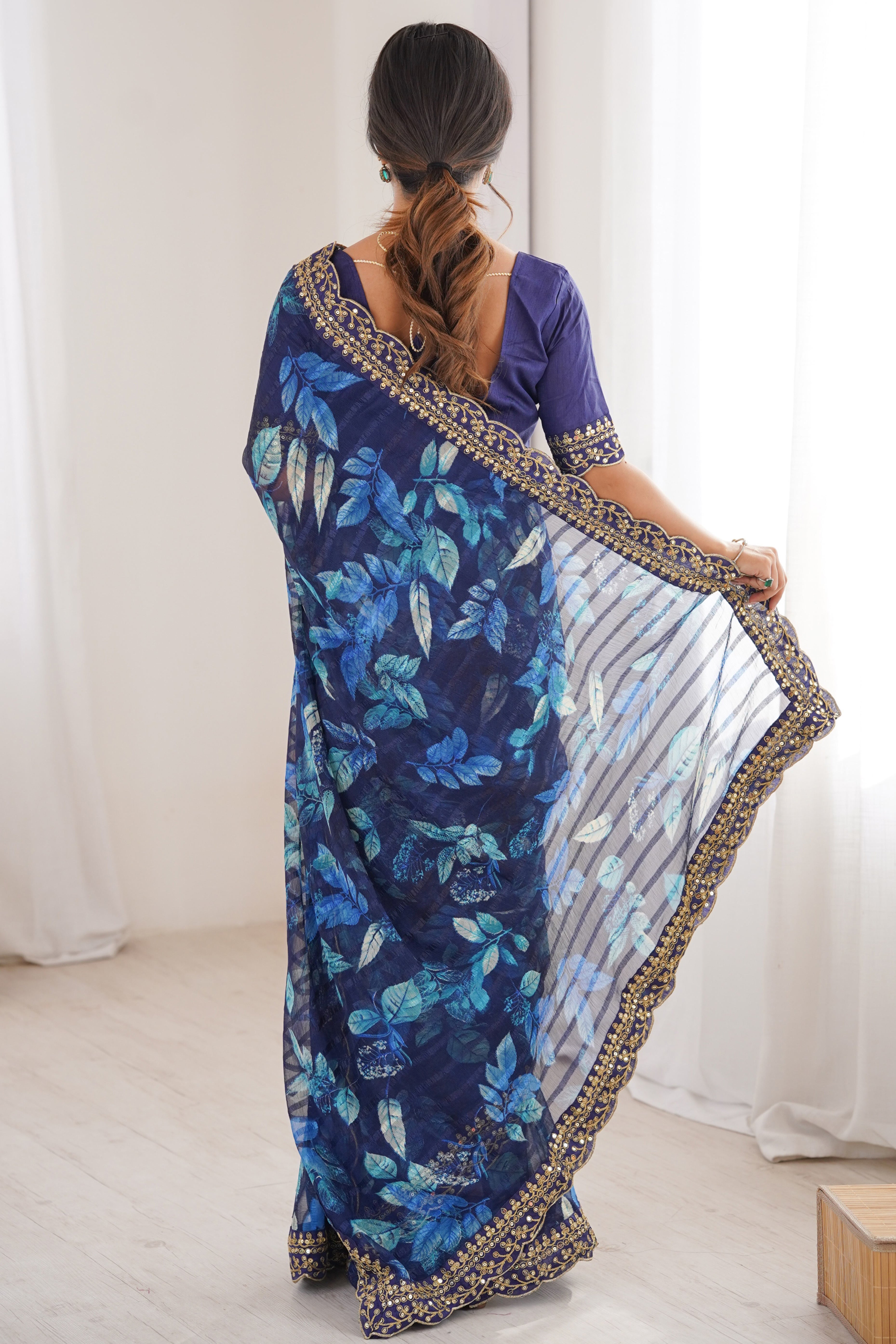 Elegant Blue Leaf & Floral Print Georgette Saree With Intricate Cording Sequins Embroidery Border