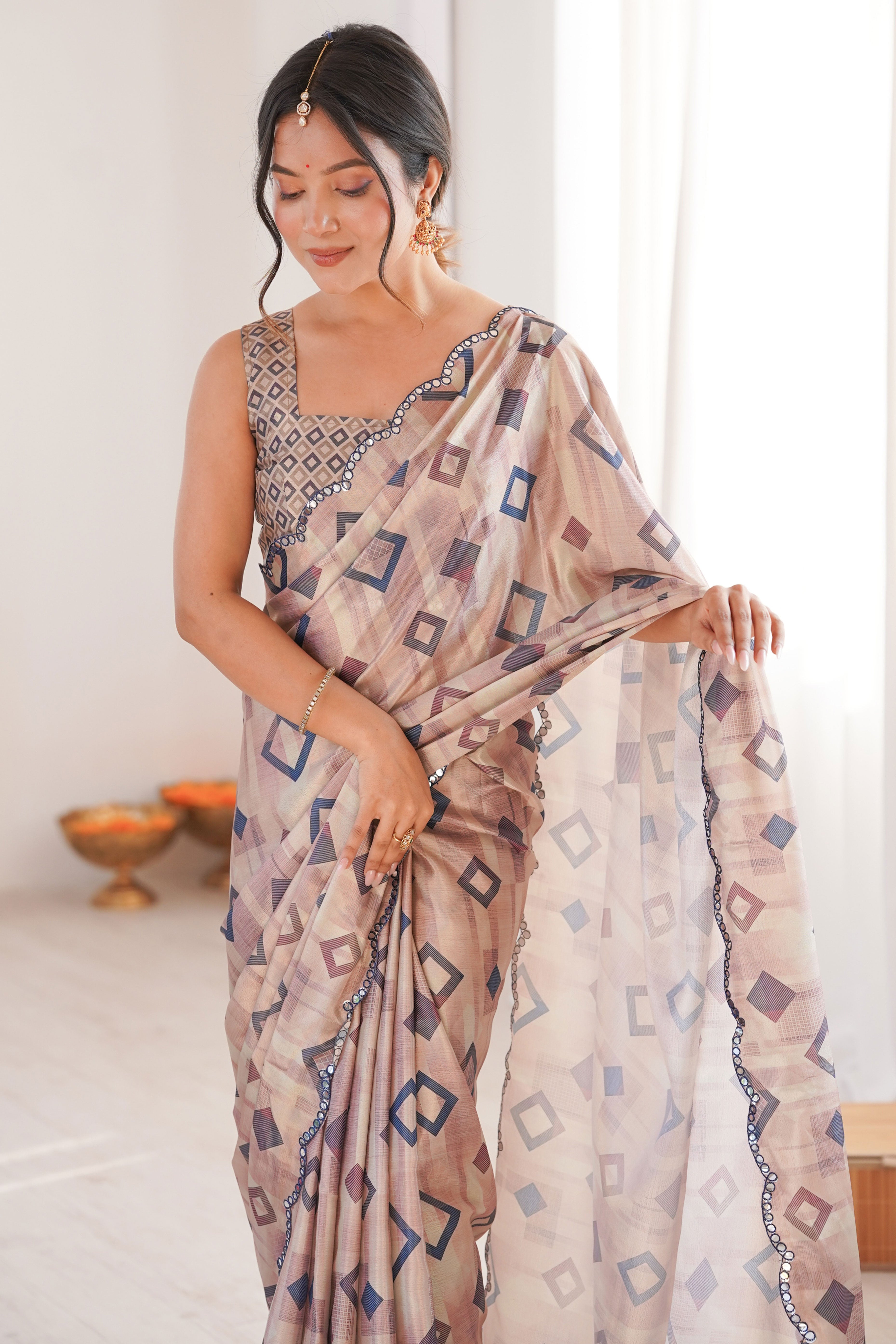 Elegant Cream Geometric Digital Printed Chinon Saree Accented With Intricate Embroidered Border