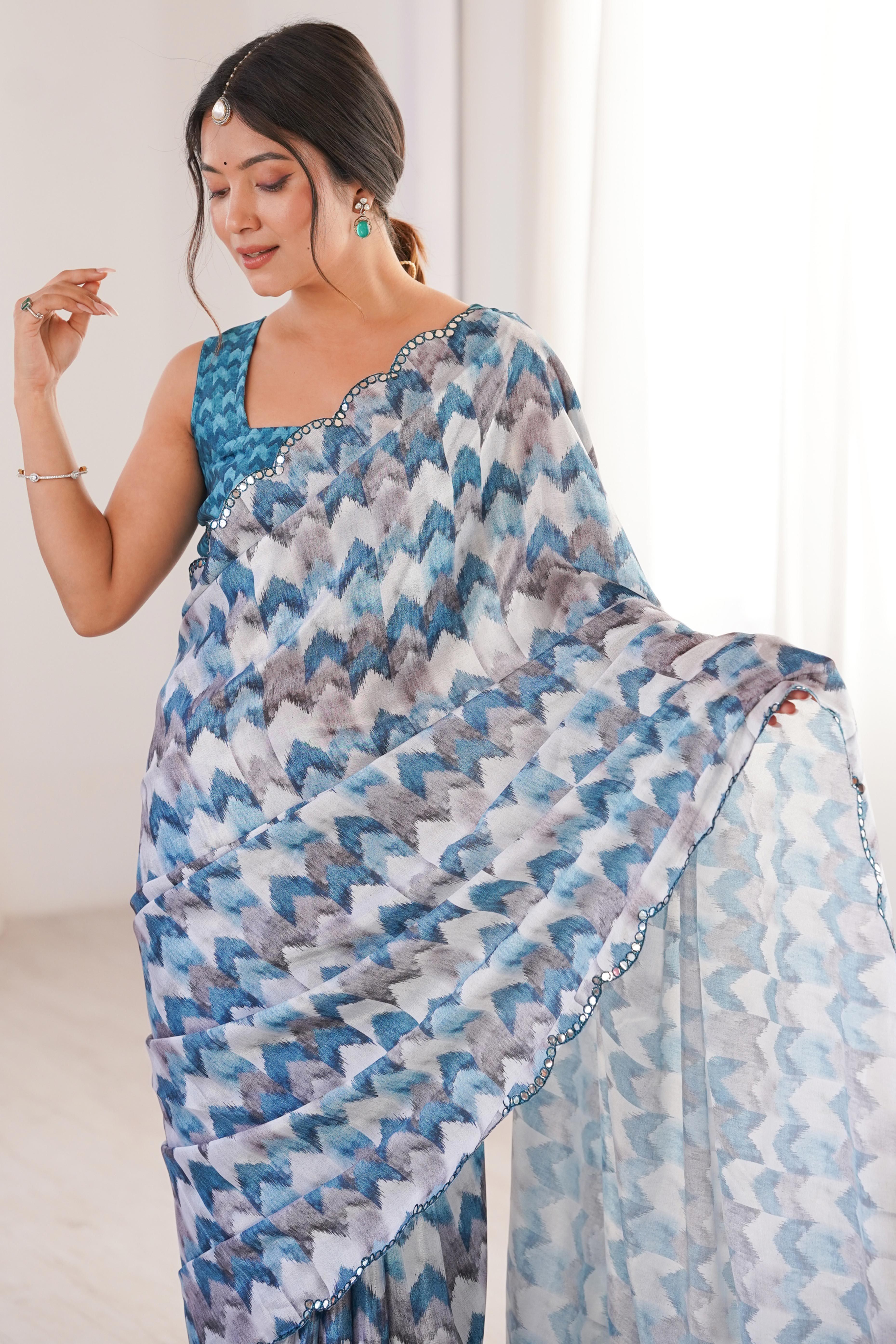 Elegant White Floral Digital Printed Chinon Saree Accented With Intricate Embroidered Border