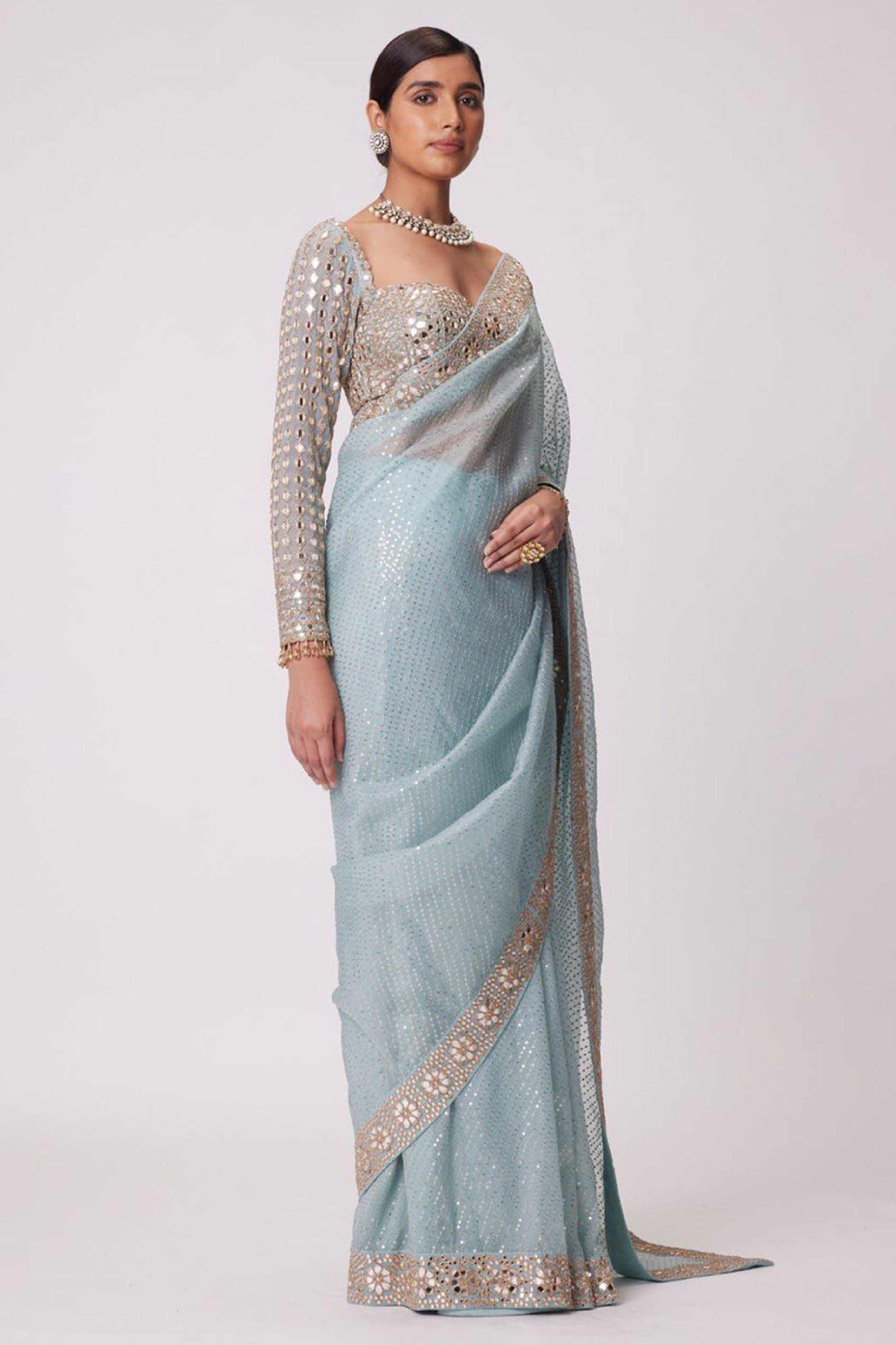 Sky Blue Faux Georgette Saree Adorned with Sequins Work and Elegant Embellishments