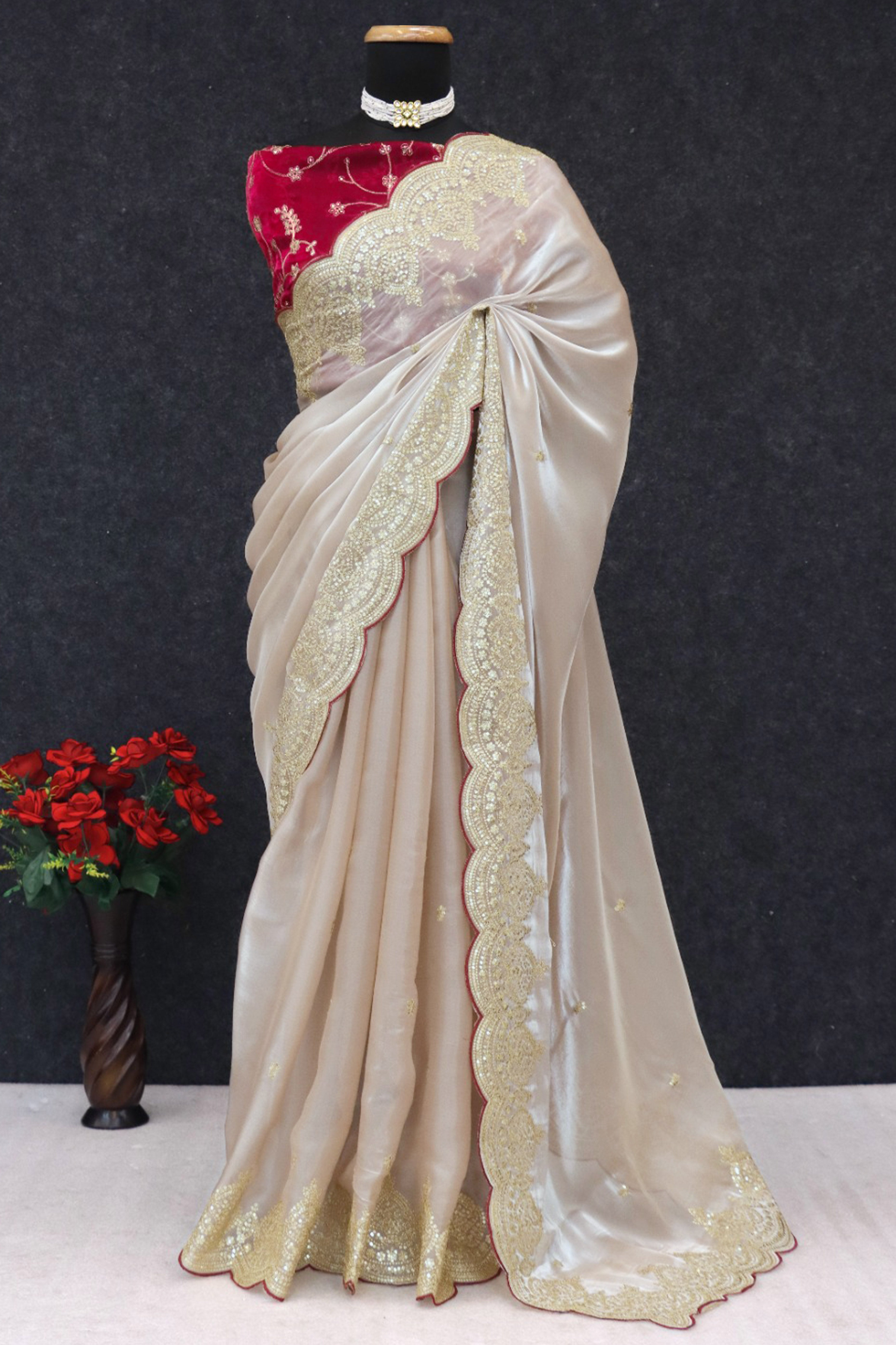 Stylish Chikoo Jimmy Choo Satin Silk Saree Beautified with Floral Zari Embroidery & Sequins Work