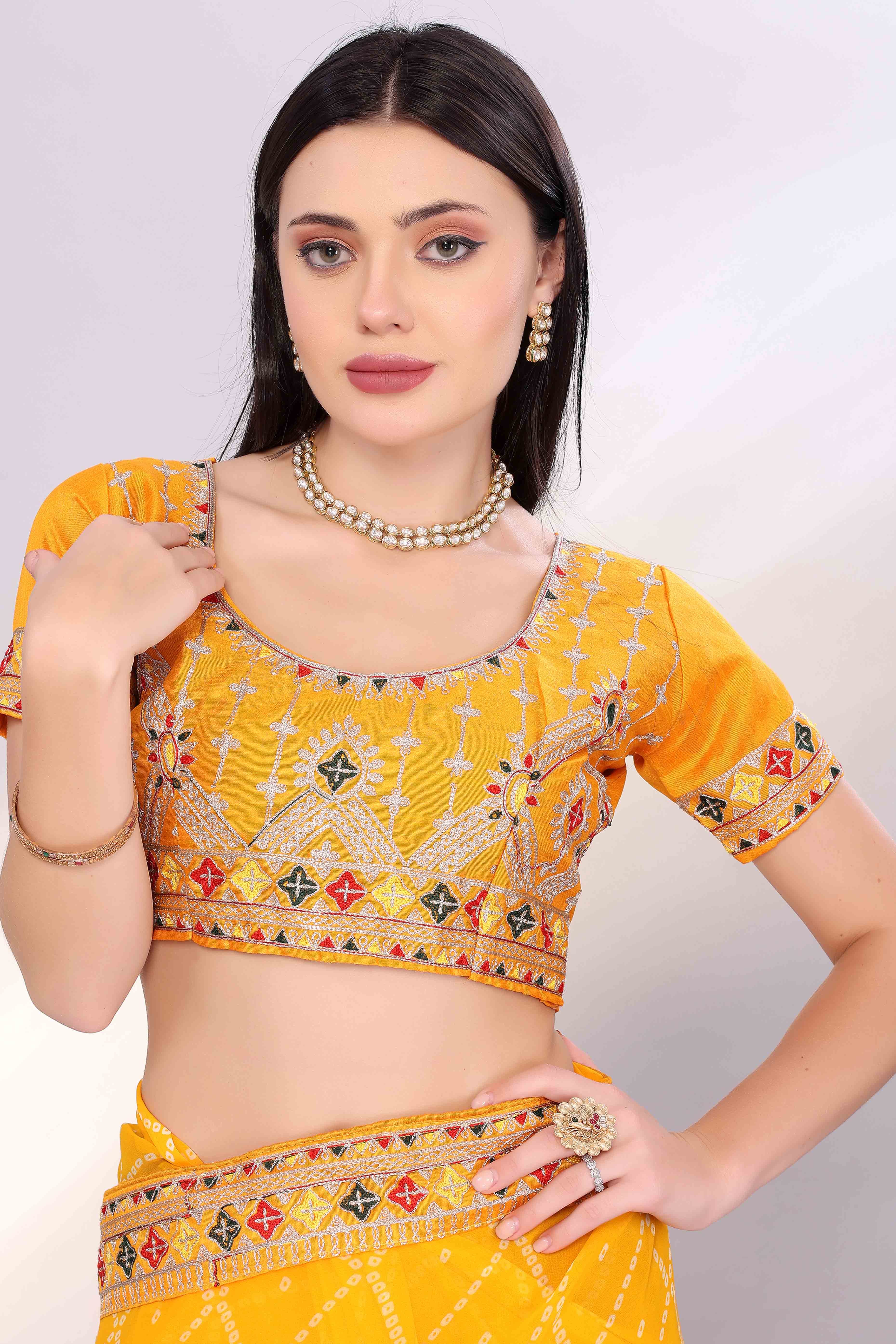 Yellow Bandhani Printed Georgette Saree Framed With Elegant Embroidered Border