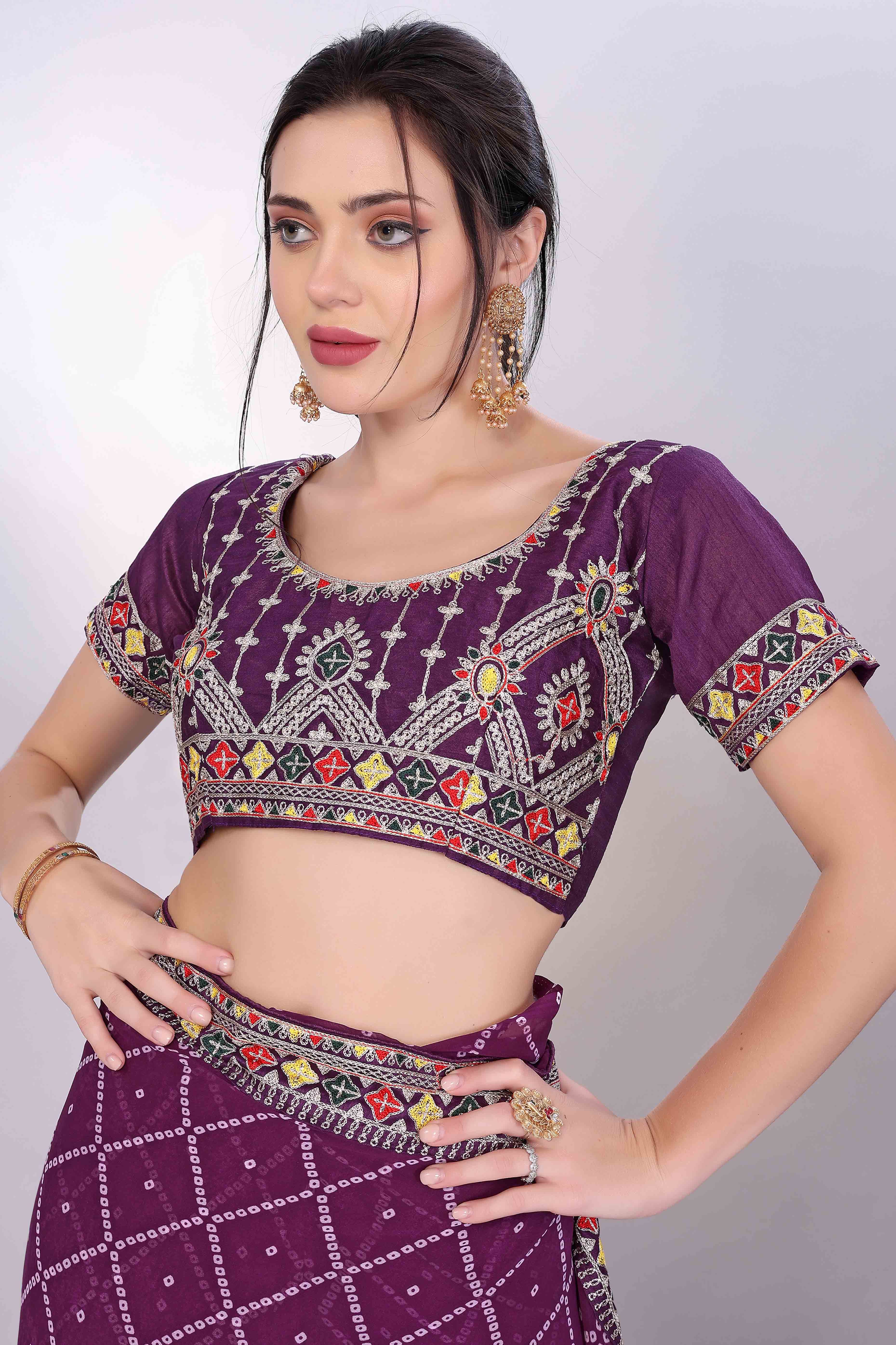 Wine Bandhani Printed Georgette Saree Framed With Elegant Embroidered Border