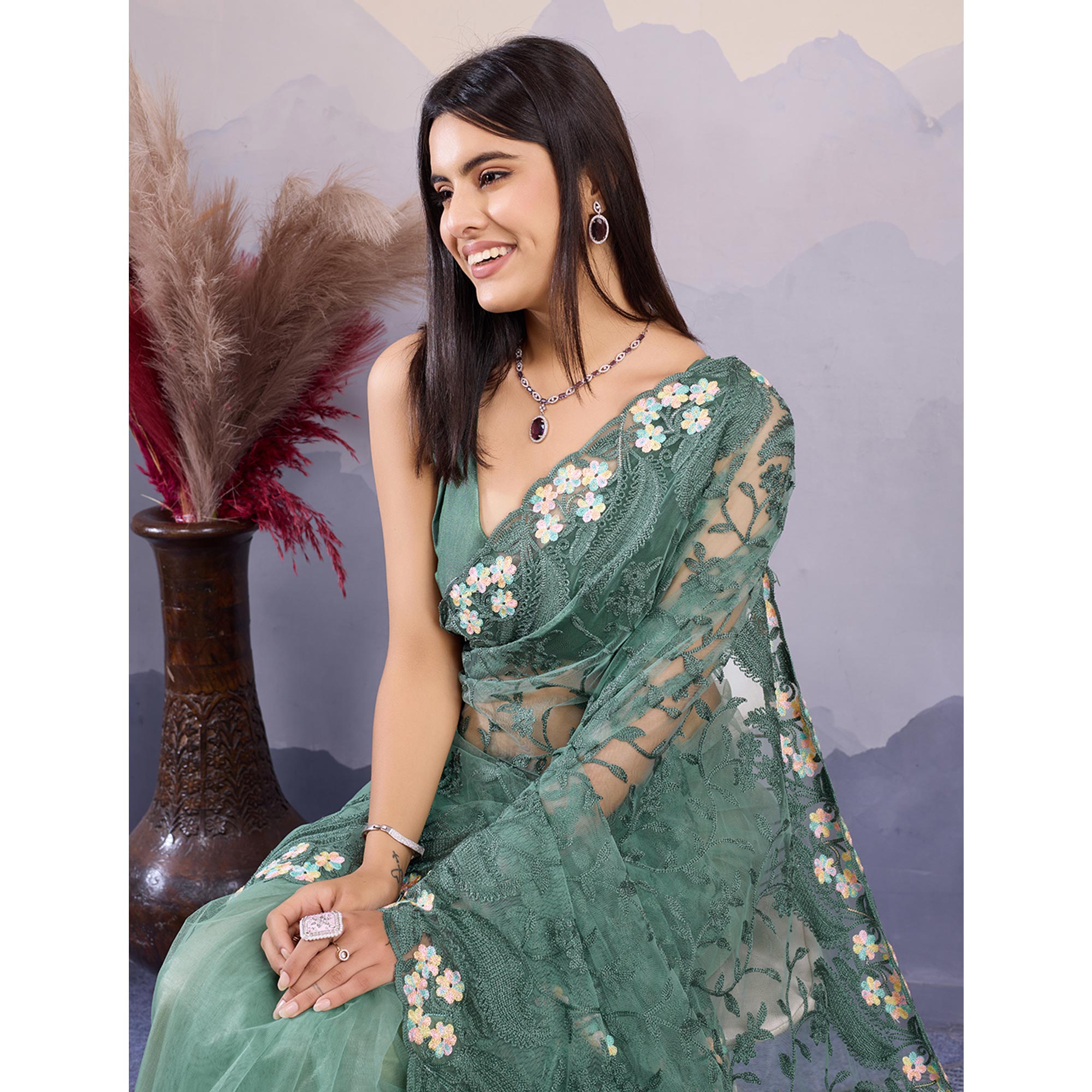 Green Floral Thread Embroidered Net Saree