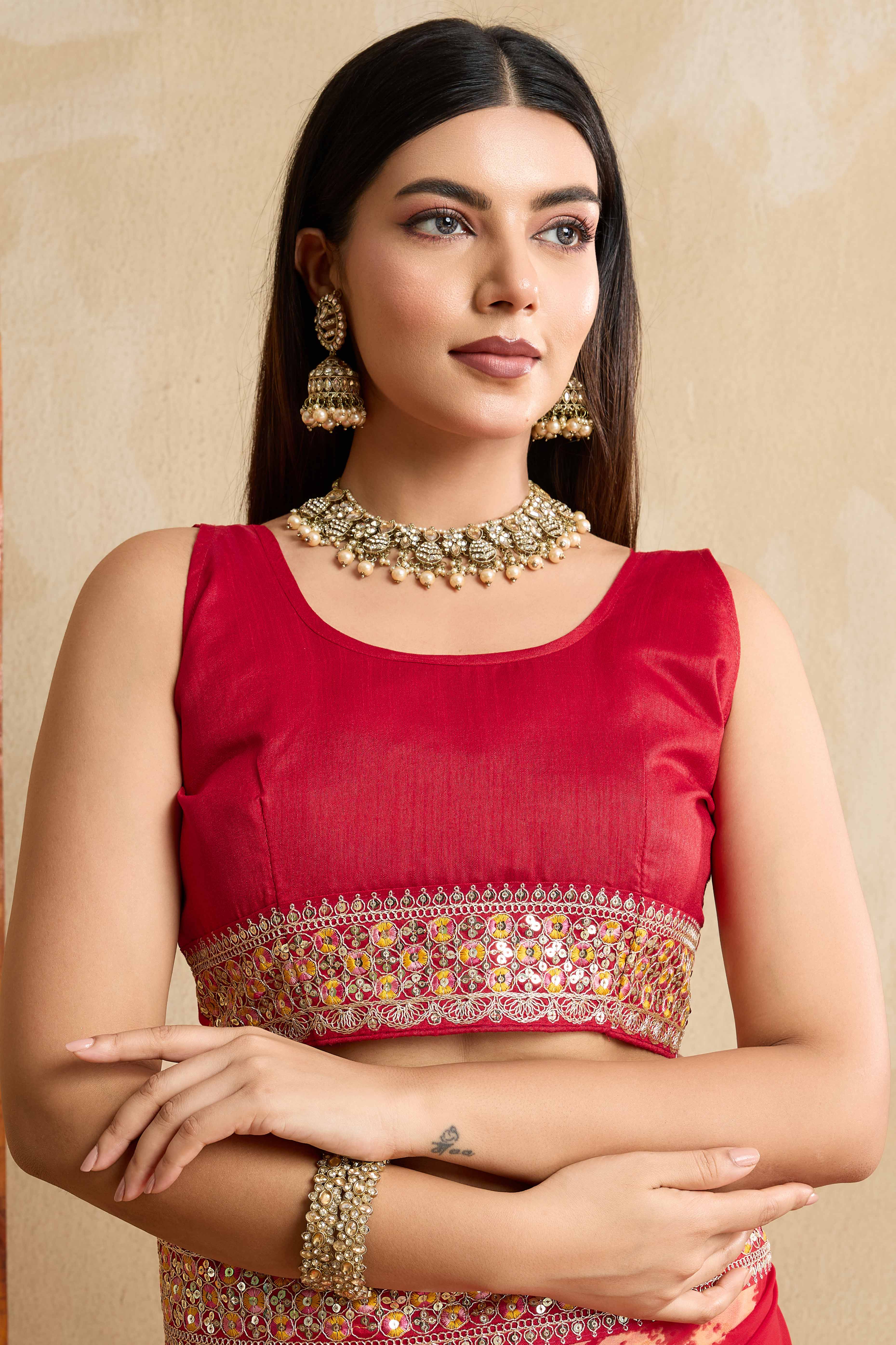 Red Georgette Saree with Contemporary Tie-Dye Patterns and Classic Lace Work Finish