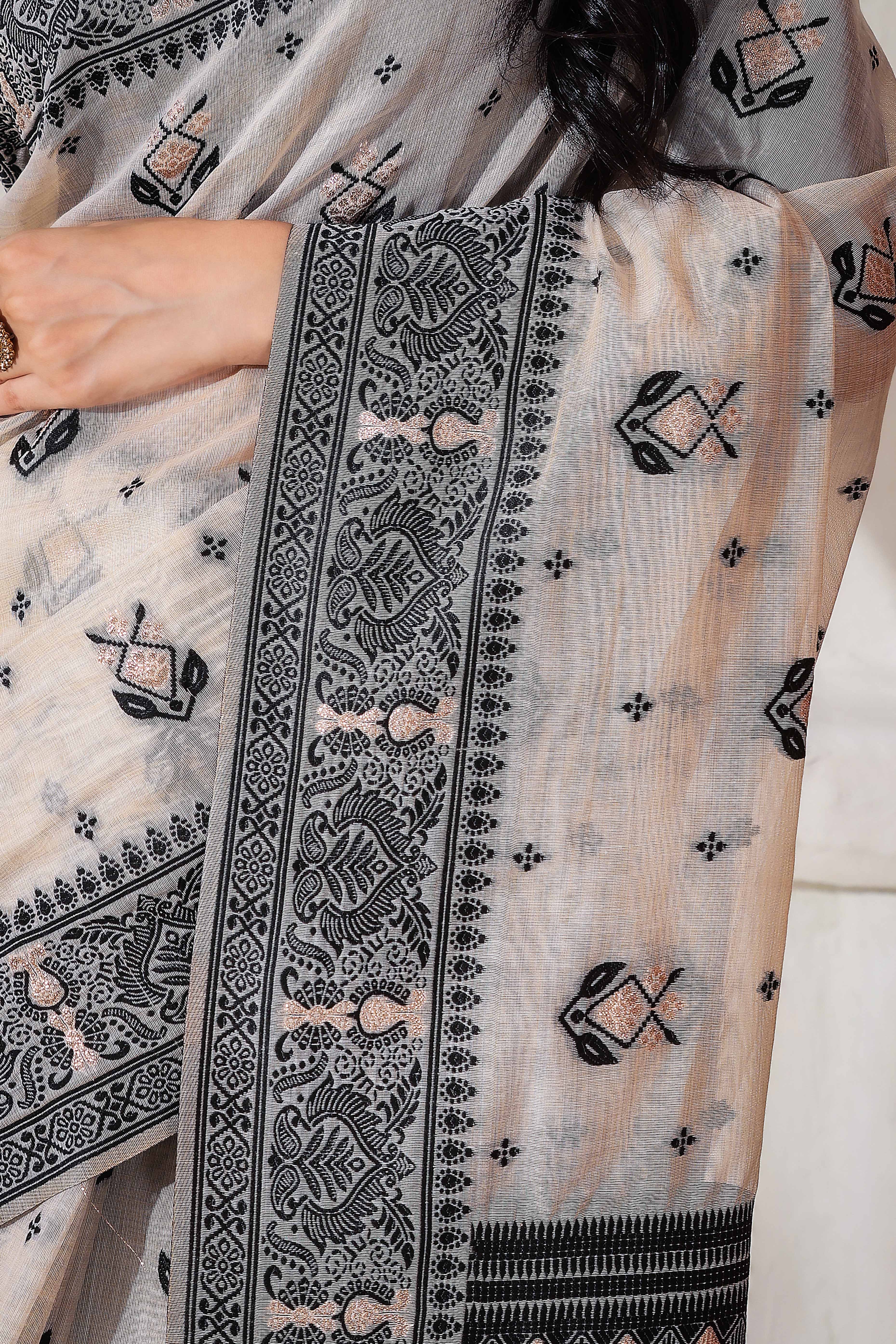 Classic Cream & Black Linen Cotton Saree Featuring Intricate Zari Weaving & Tassel Pallu