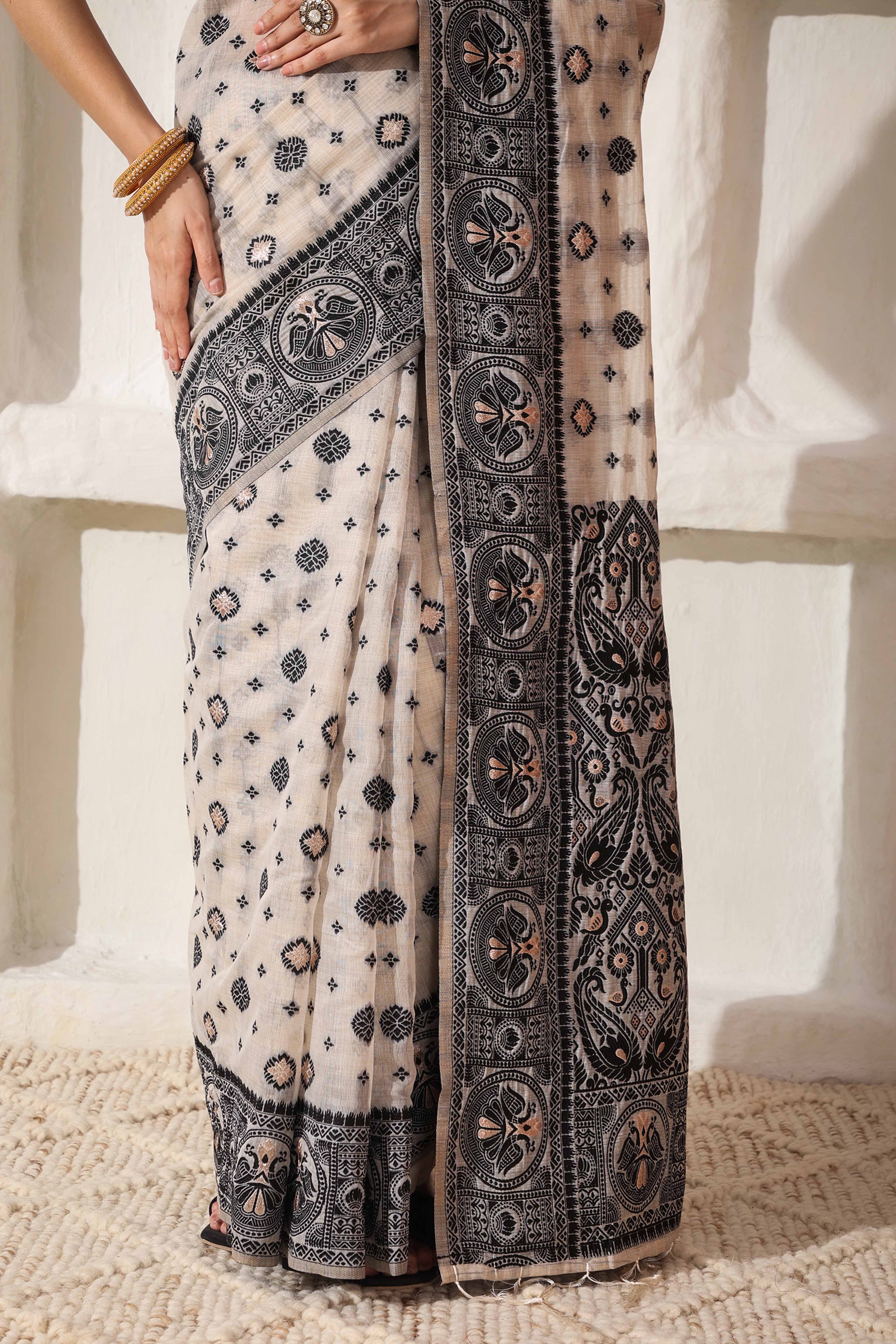 Cream & Black Saree In Linen Cotton With Traditional Zari Woven Detailing And Tassel Pallu