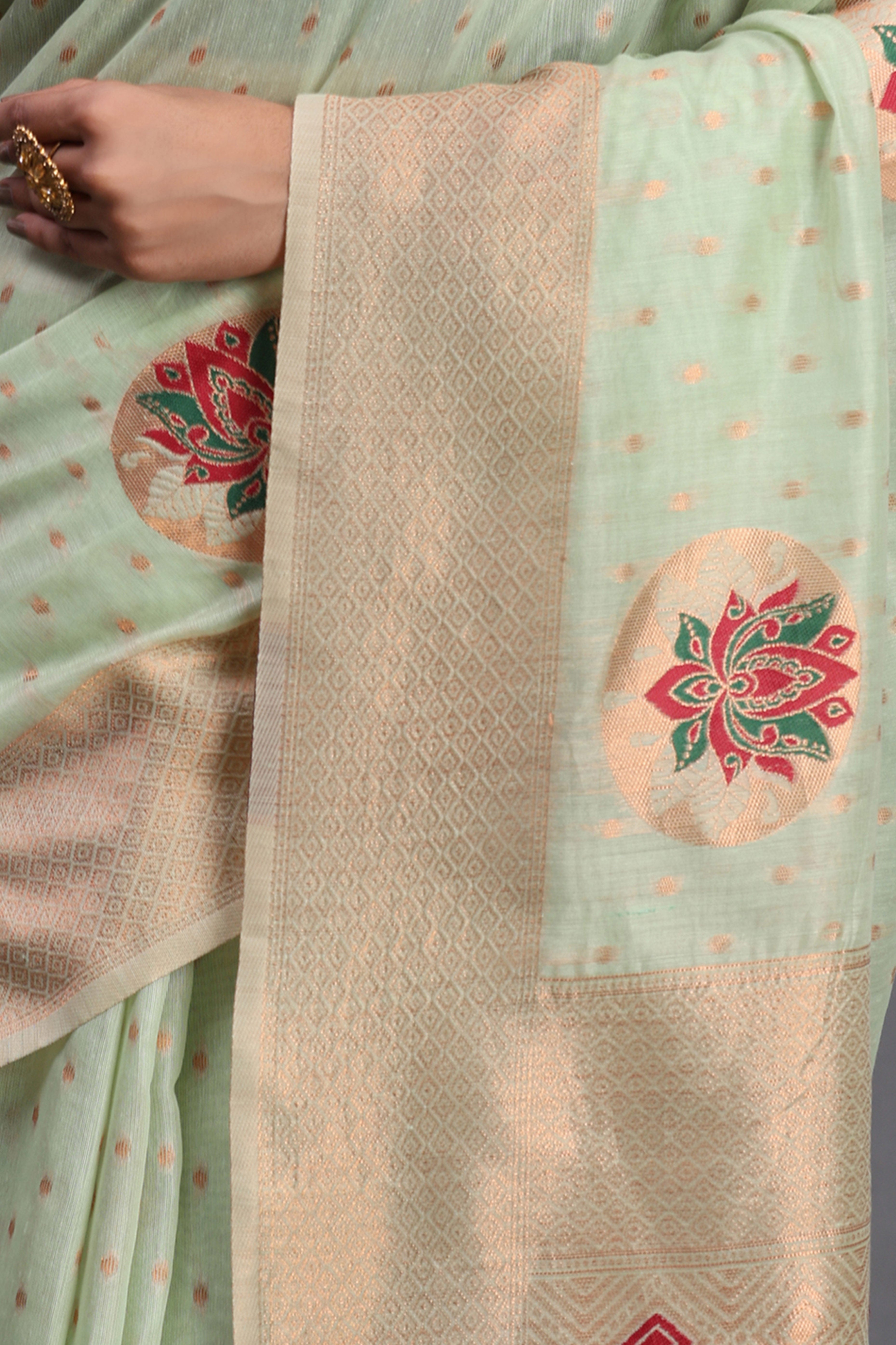 Stylish Light Green Floral Zari Weaving Linen Cotton Saree With Graceful Tassel Pallu