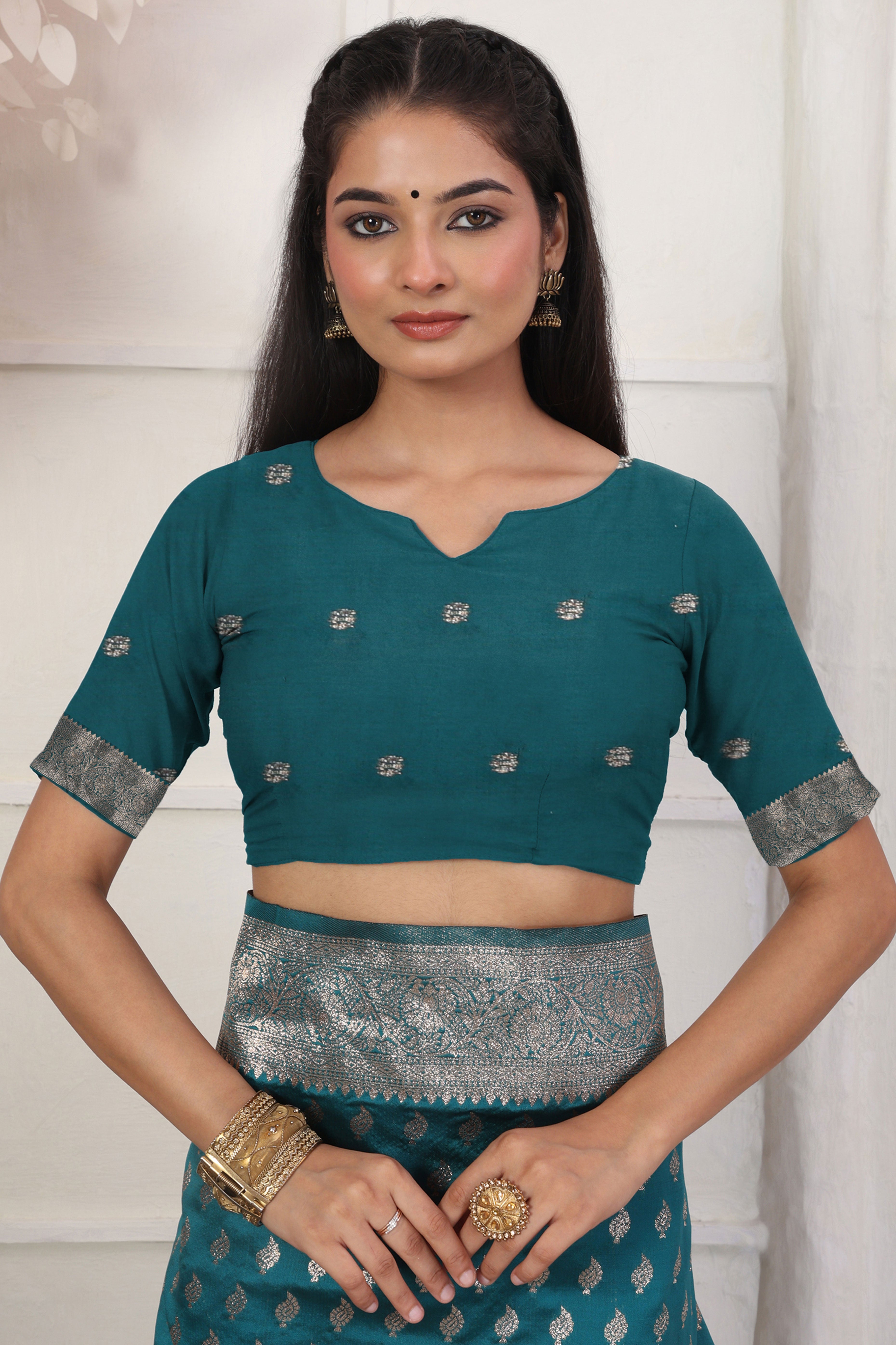 Rama Blue Traditional Lichi Silk Blend Saree Enhanced With Floral Zari Weaving & Tassel Pallu