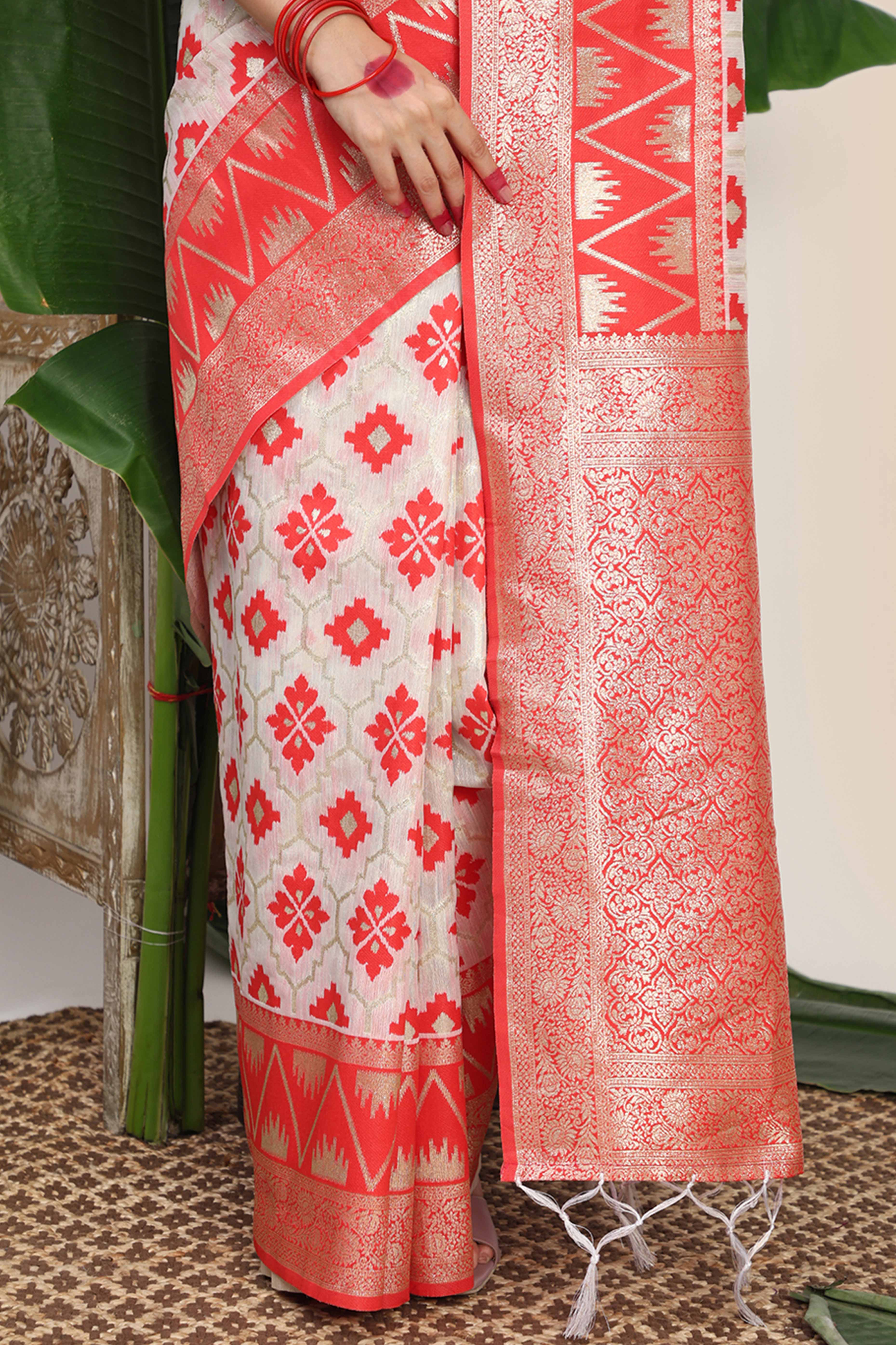 Vibrant White & Red Linen Cotton Saree Featuring Timeless Zari Weaving And Elegant Tassel Pallu