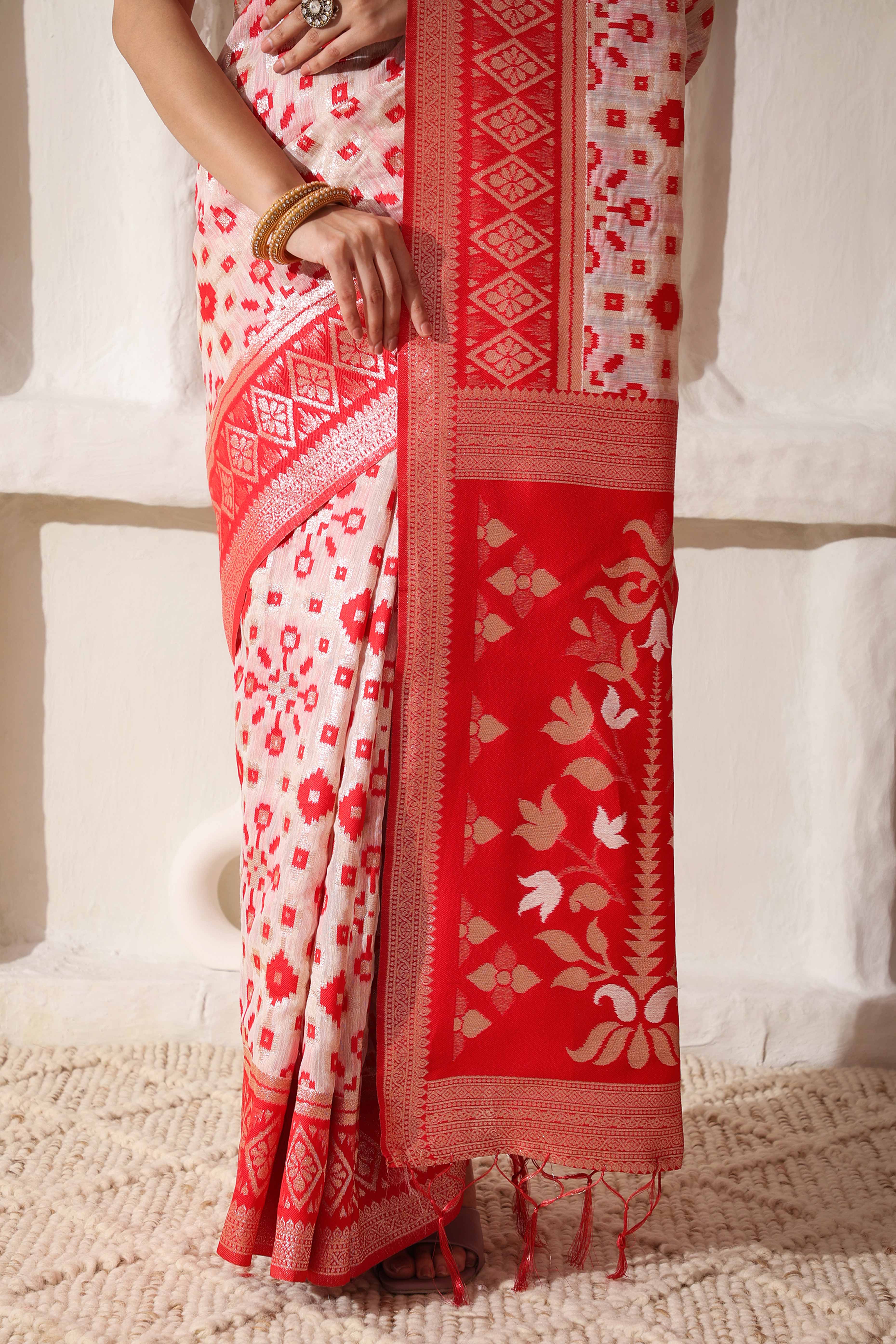 Elegant White & Red Zari Woven Linen Cotton Saree With Graceful Tassel Detailing