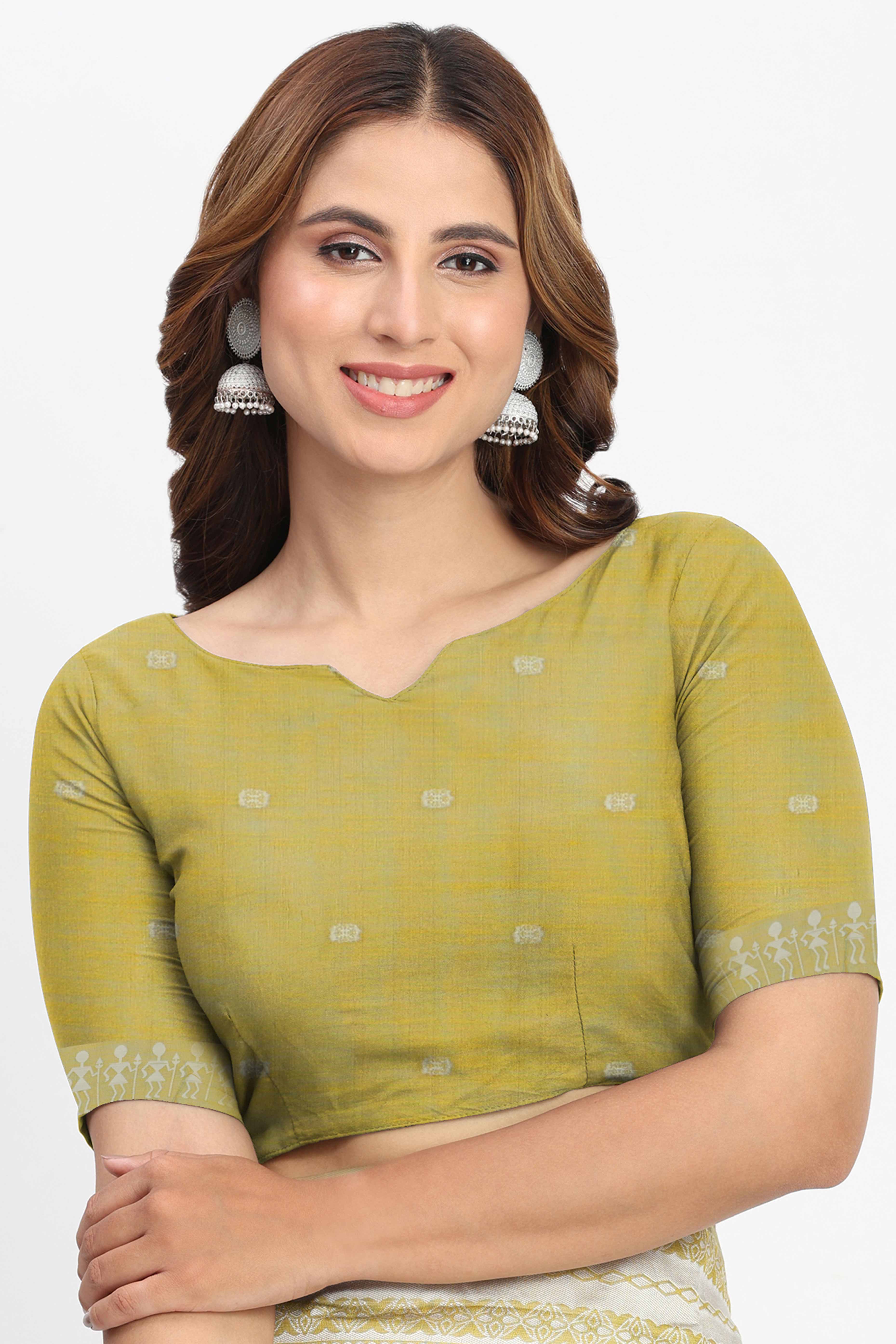 Green Linen Cotton Saree Showcasing Traditional Warli Motifs In Zari Weaving With Tassel Pallu