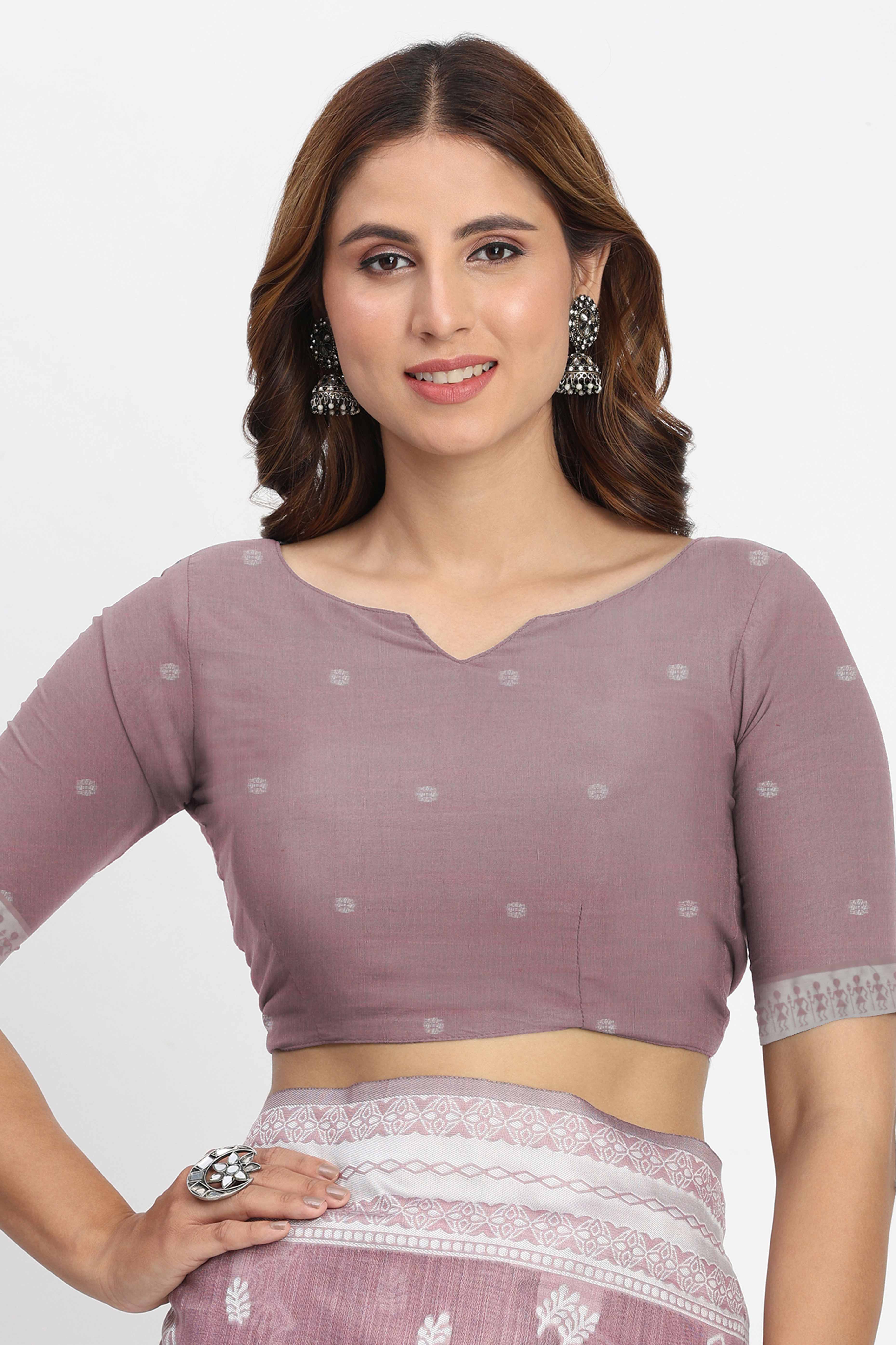 Mauve Linen Cotton Saree Showcasing Traditional Warli Motifs In Zari Weaving With Tassel Pallu