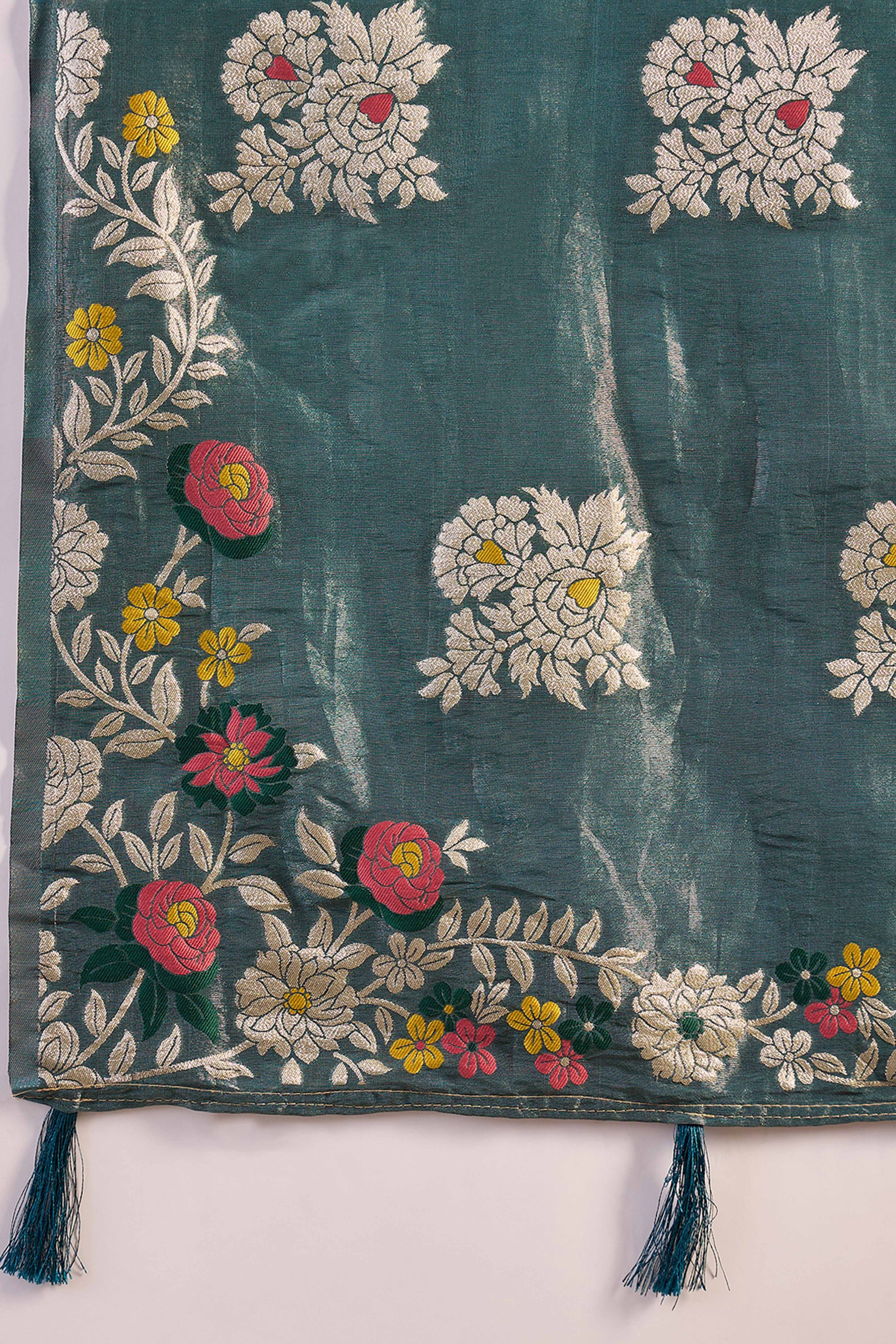 Teal Blue Saree In Shimmer Fabric With Floral Zari Weaving & Decorative Tassel Pallu