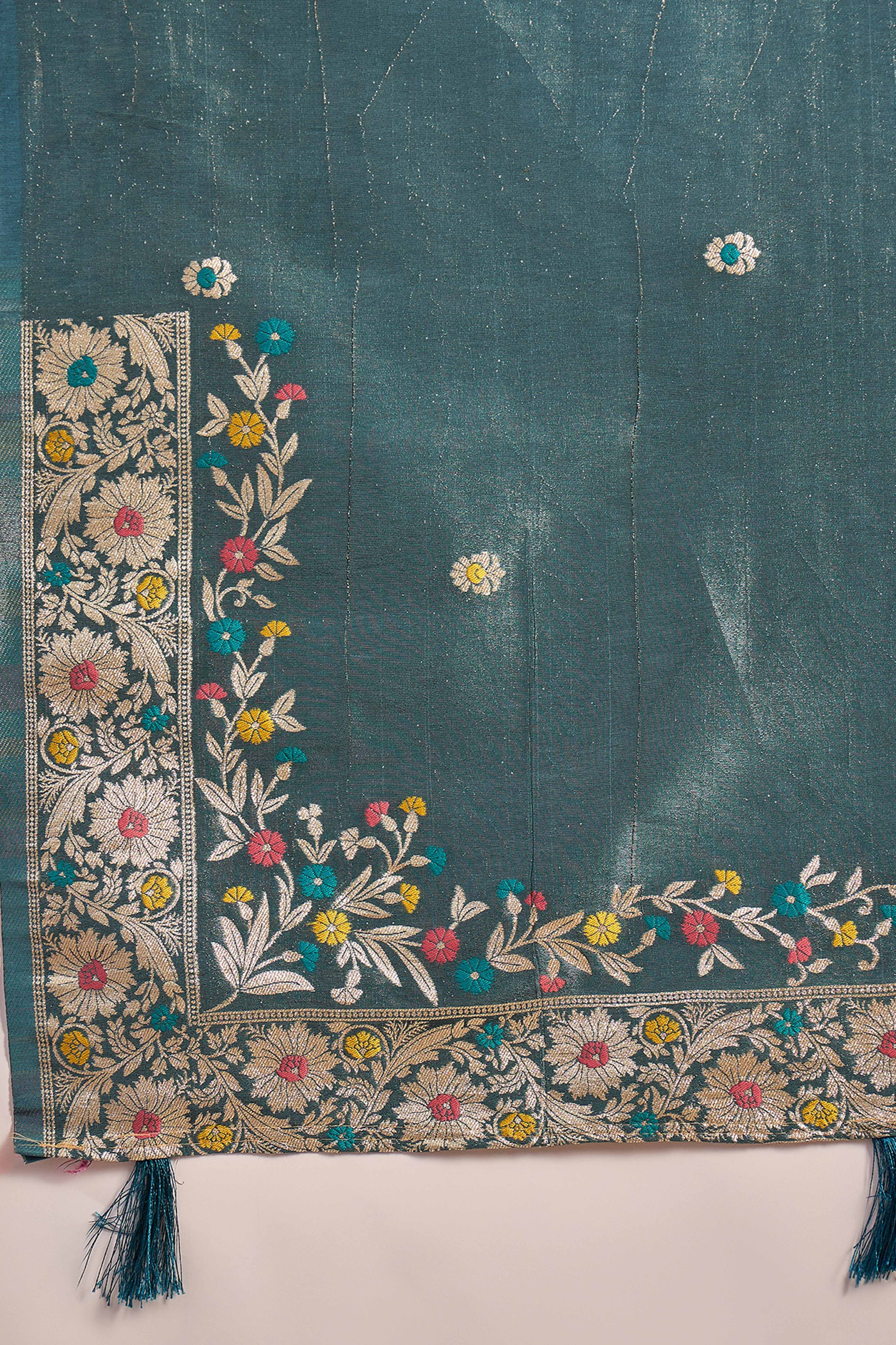 Teal Blue Zari Woven Shimmer Saree With Floral Motifs & Flowing Tassel Pallu