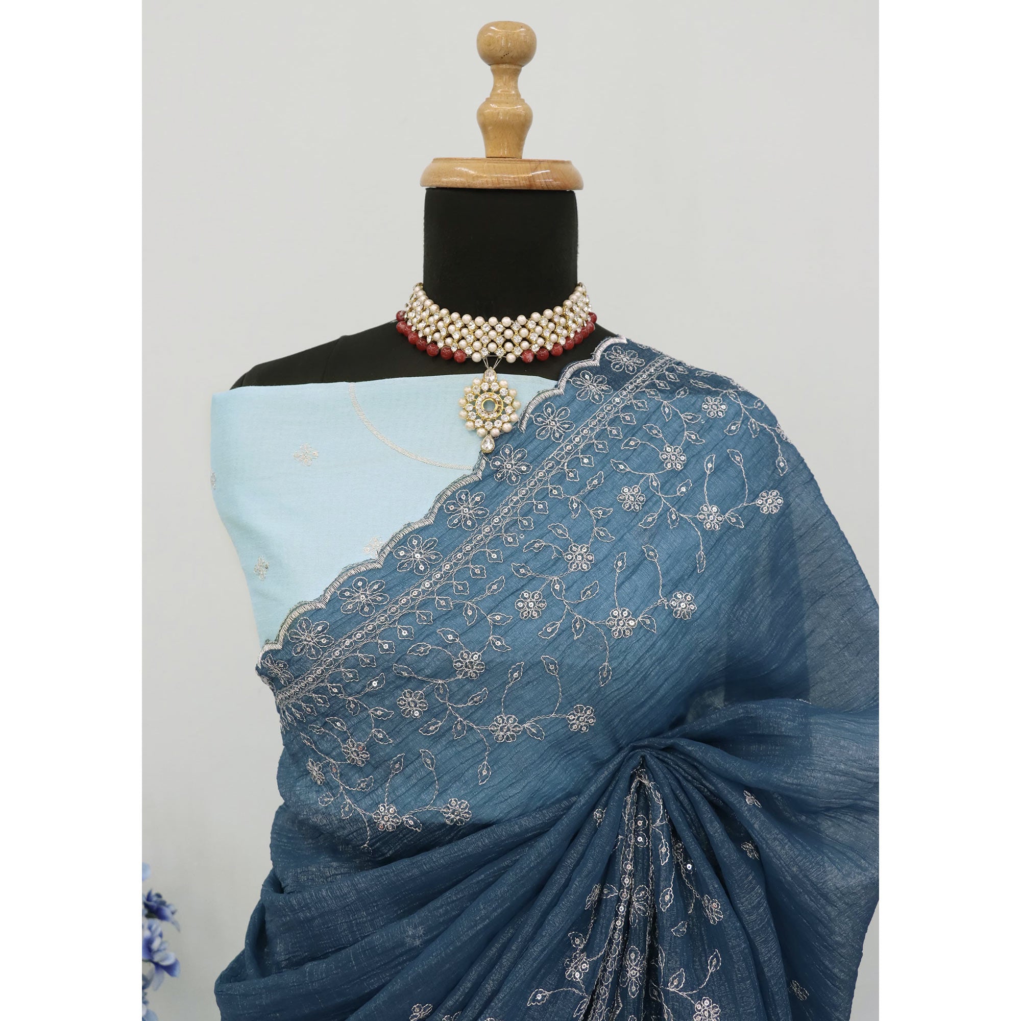 Dusty Blue Silk Blend Crush Saree Adorned With Floral Thread Embroidery & Sequins