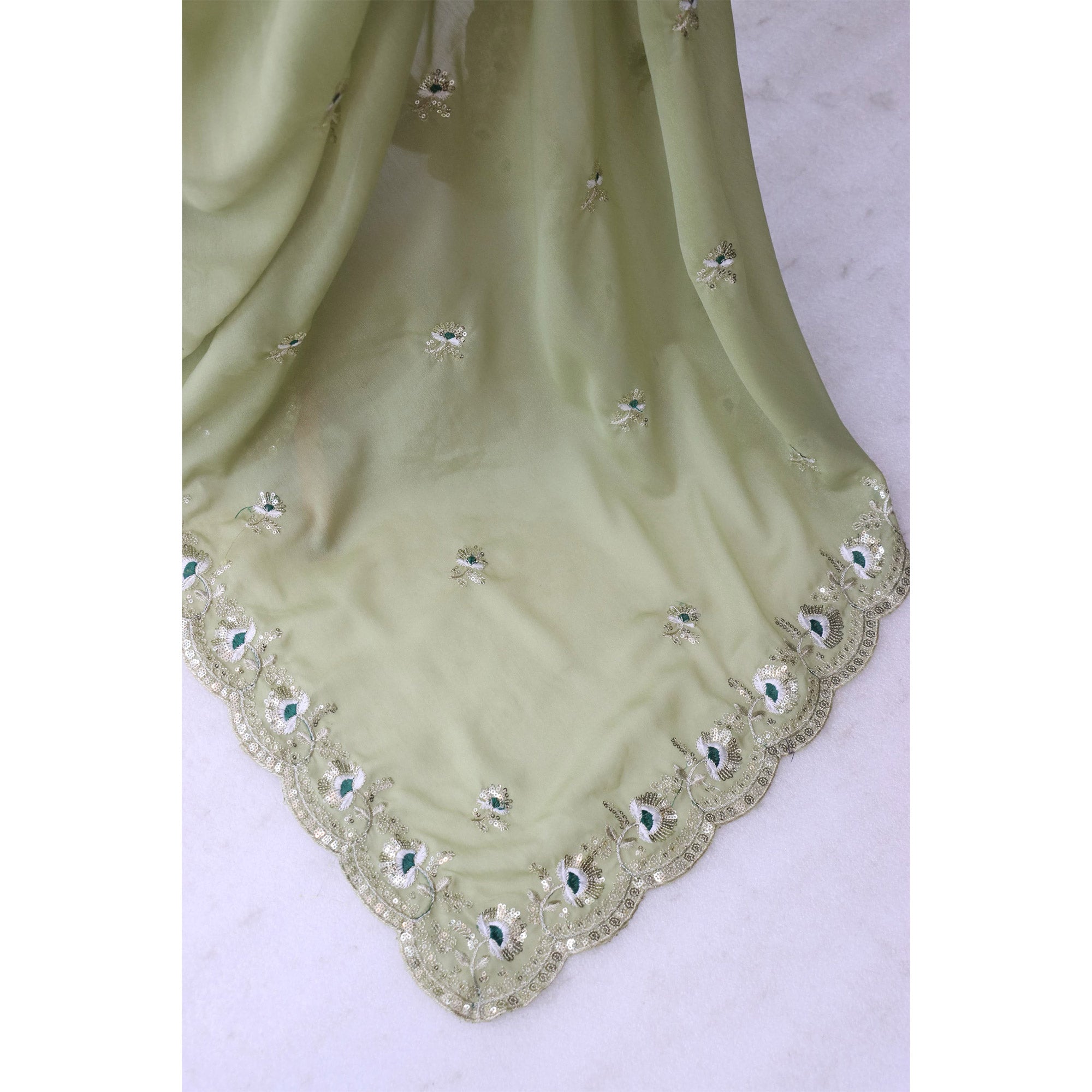 Green Georgette Silk Saree With Floral Sequin Embroidery & Graceful Cutwork Detailing Border