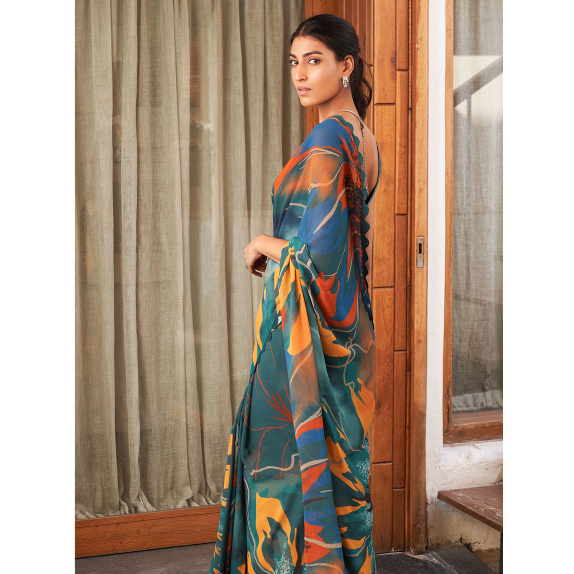 Teal Printed Moss Satin Saree