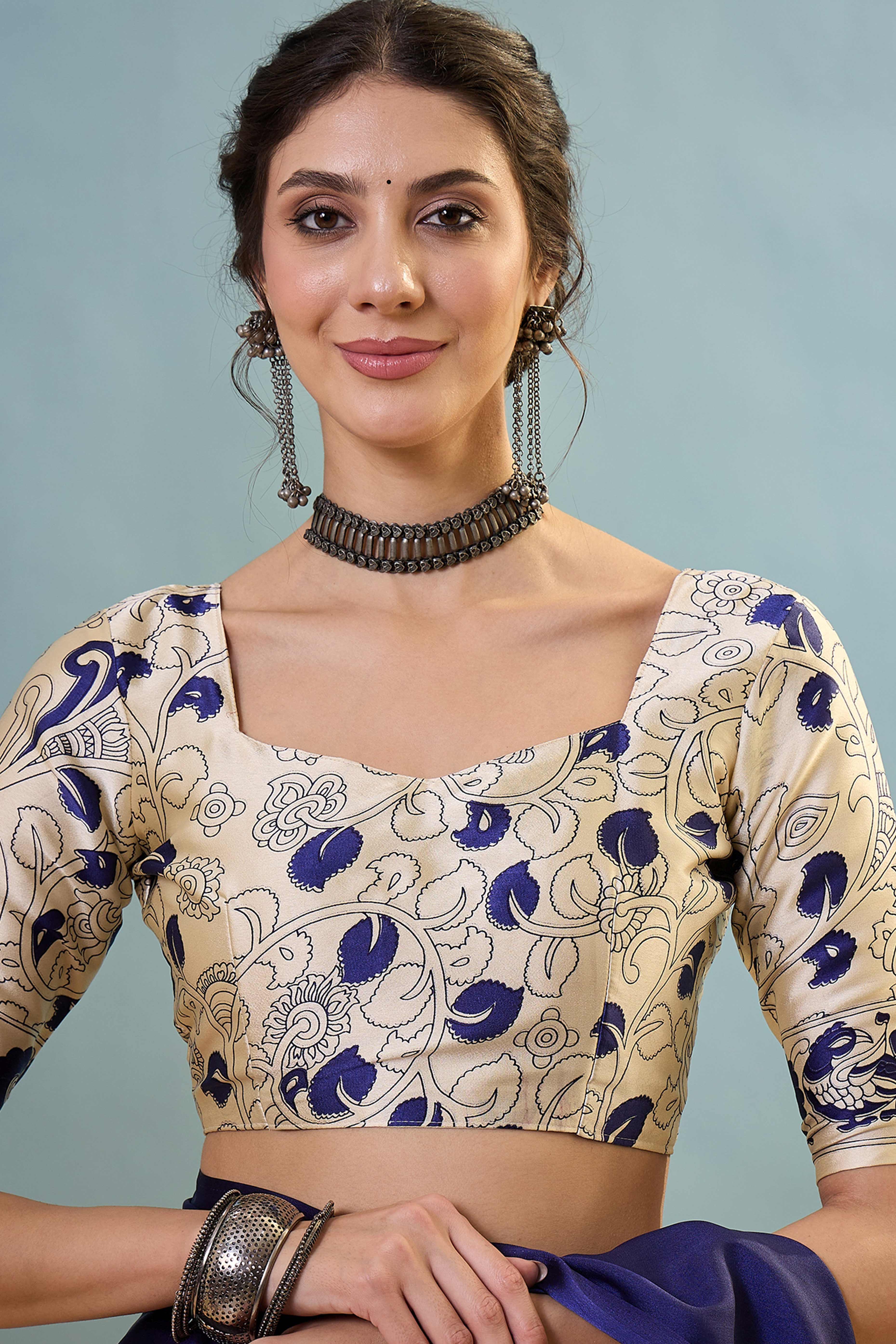 Blue Kalamkari Style Modal Satin Saree Featuring Intricate Artistic Prints