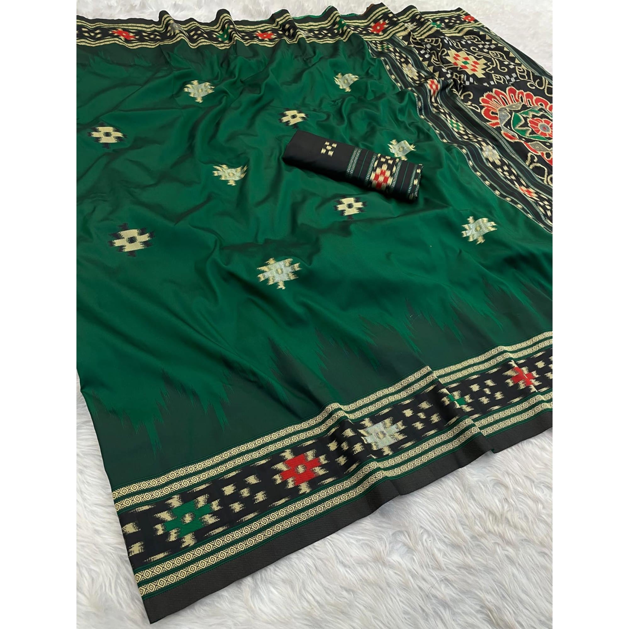 Green Art Silk Saree Adorned with Intricate Patola Style Woven Designs