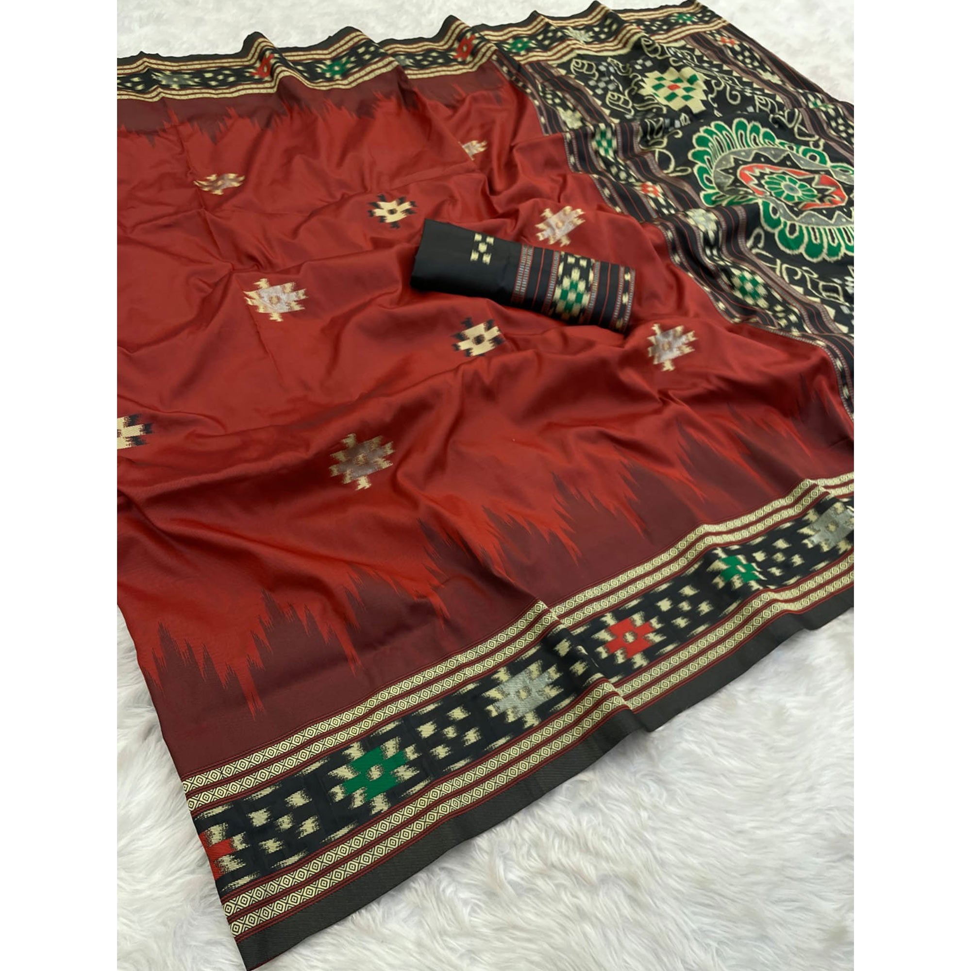 Maroon Art Silk Saree Adorned with Intricate Patola Style Woven Designs