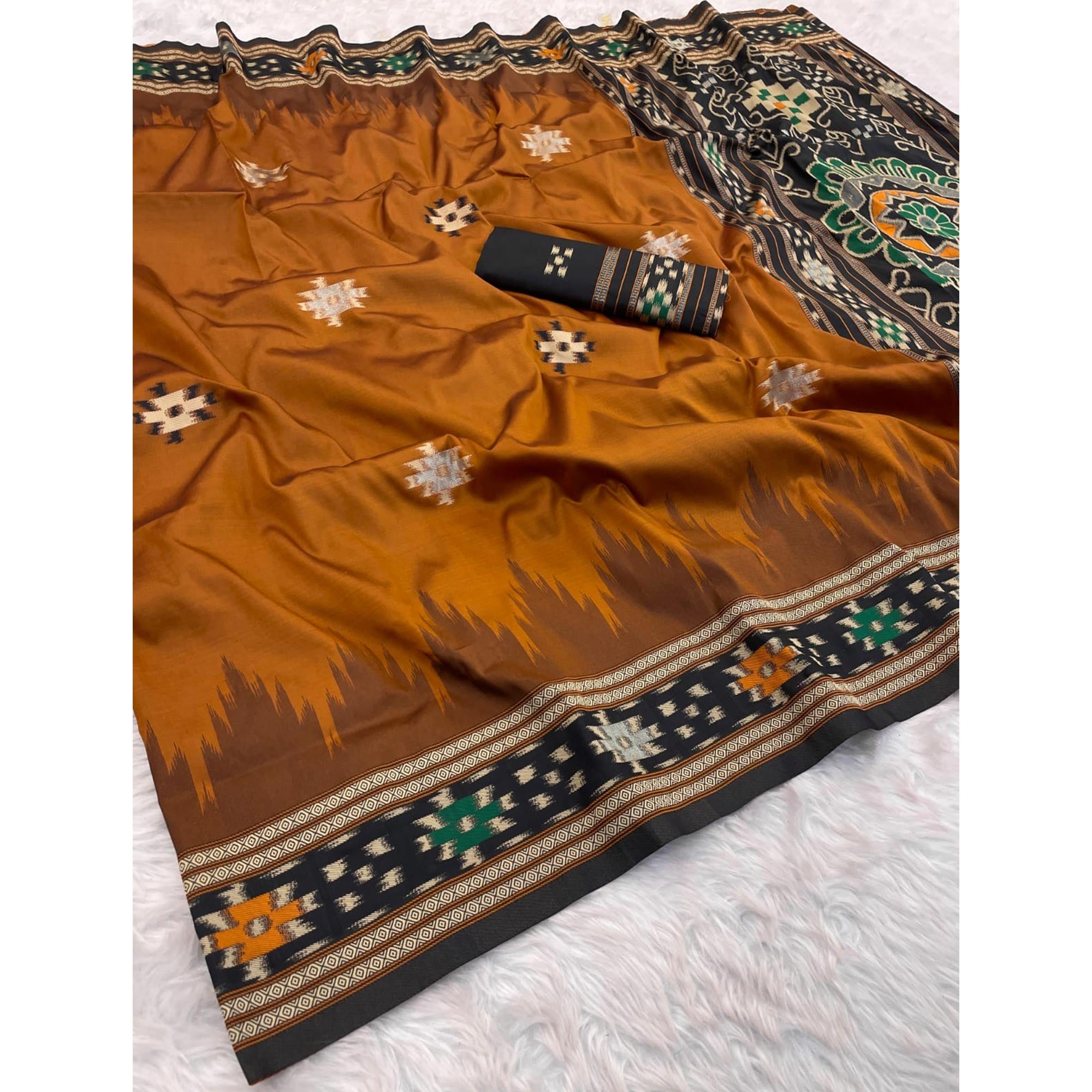 Brown Art Silk Saree Adorned with Intricate Patola Style Woven Designs