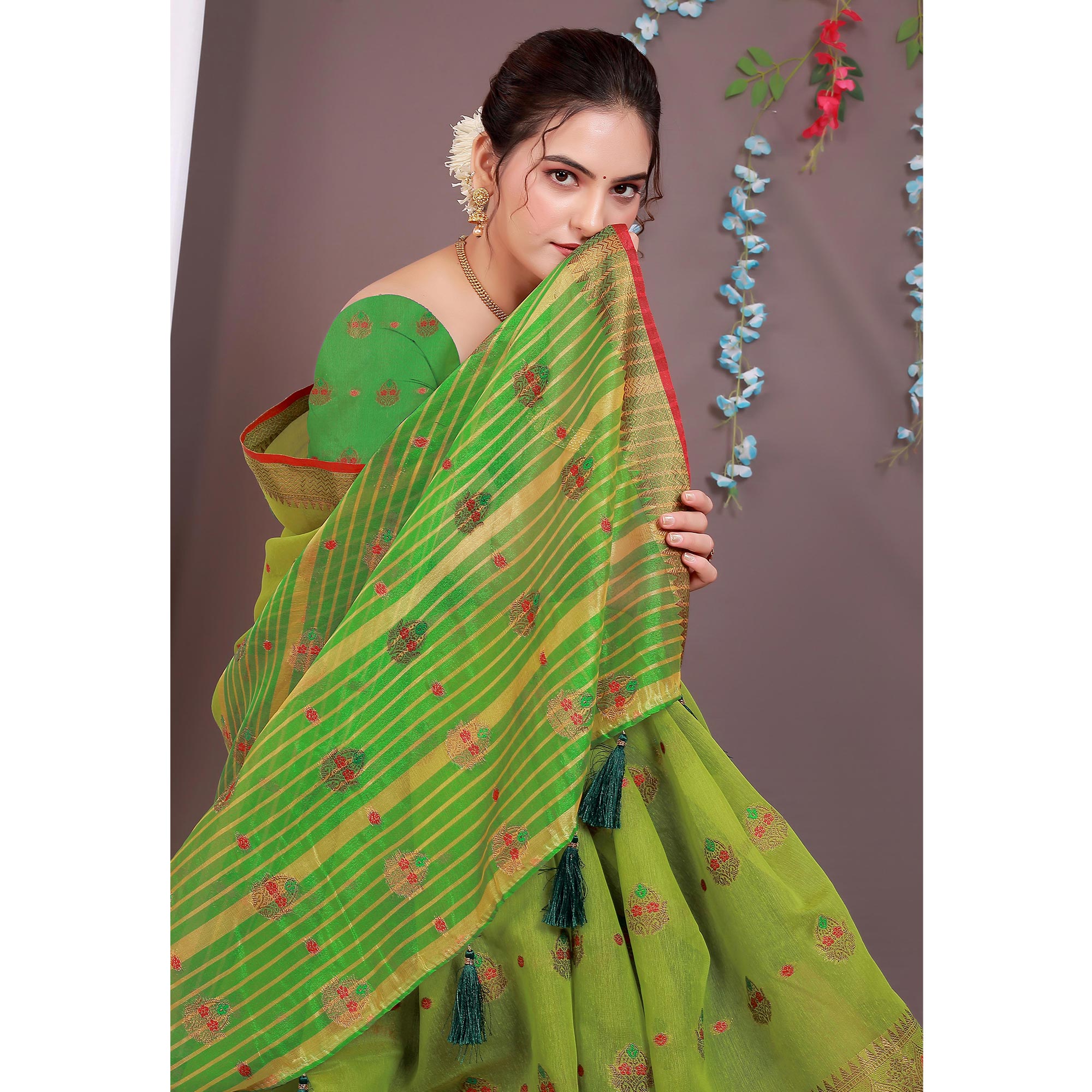 Green Floral Woven Cotton Silk Saree With Tassels
