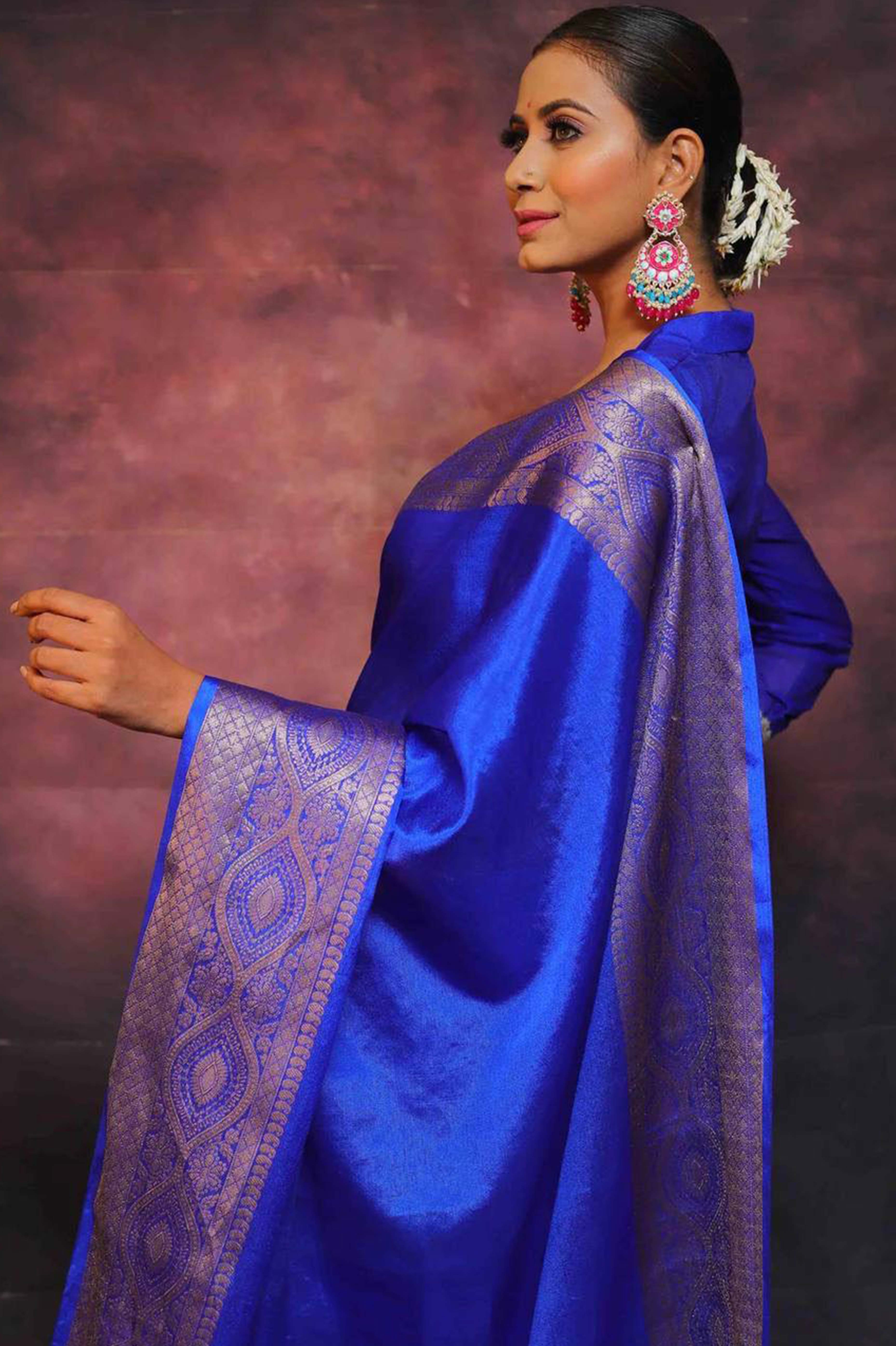 Majestic Royal Blue Floral Zari Woven Lichi Banarasi Silk Saree