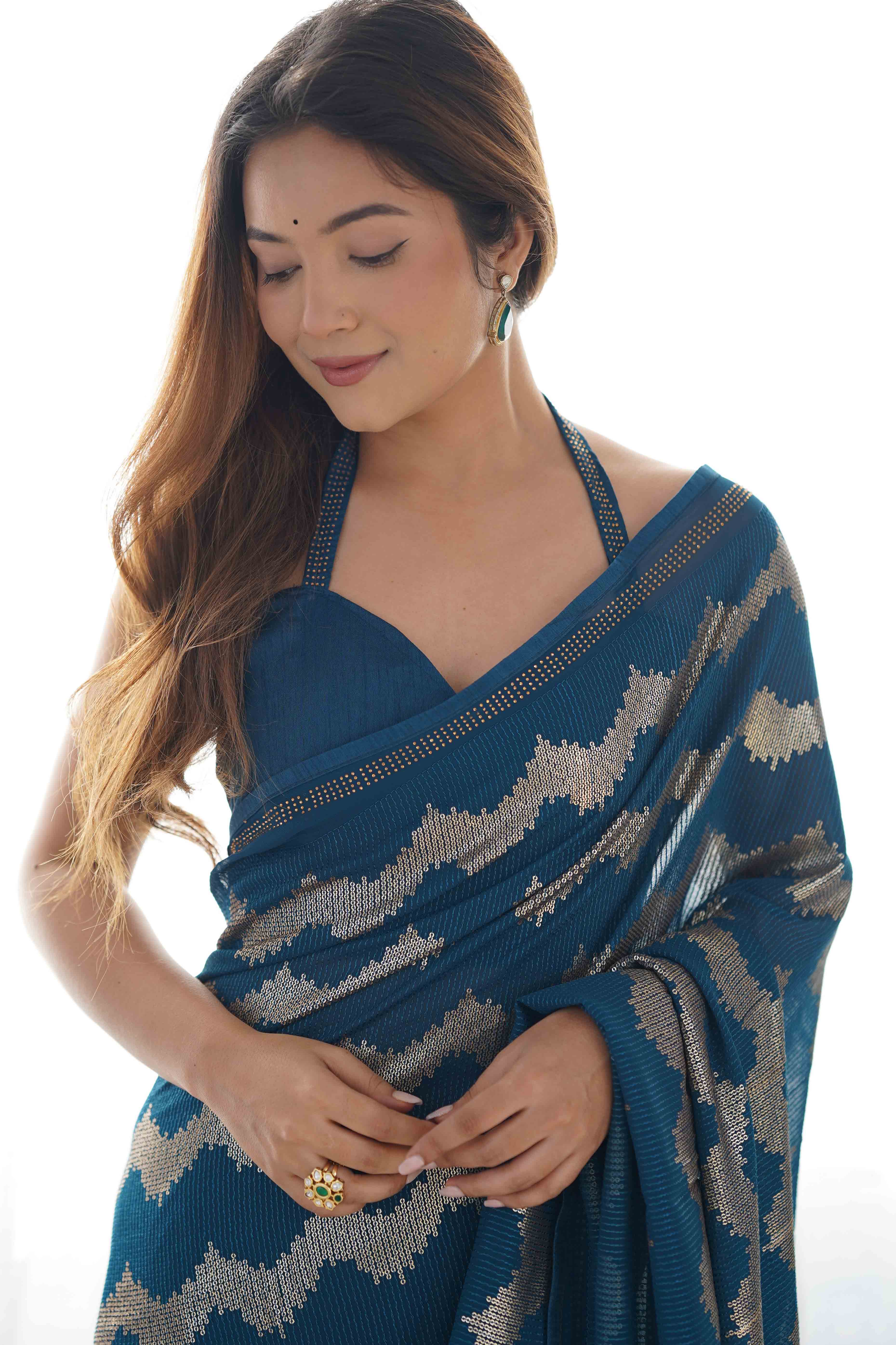 Teal Sequins Embroidered Georgette Saree